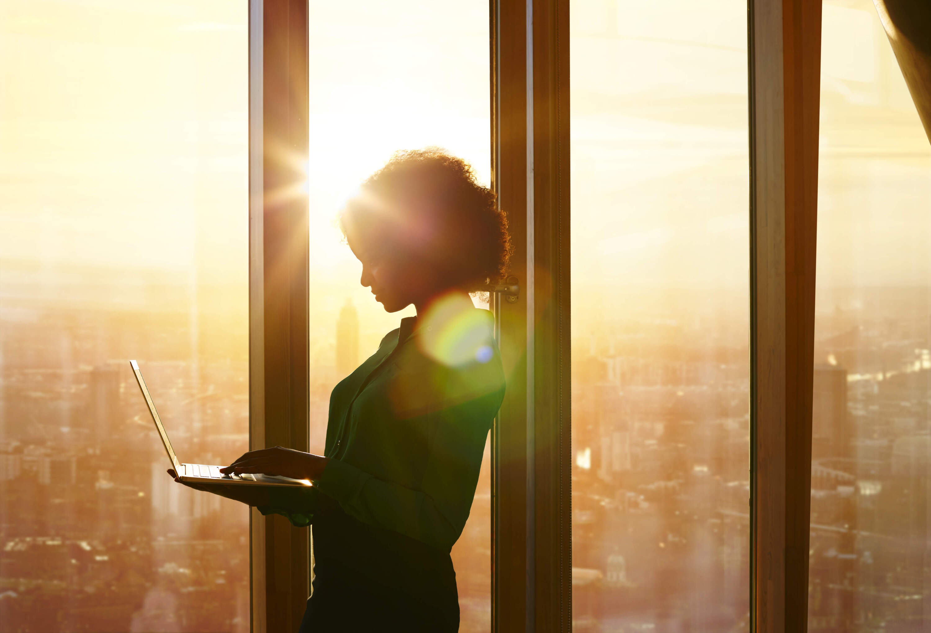 A woman uses a laptop. (Ezra Bailey/Getty Images)