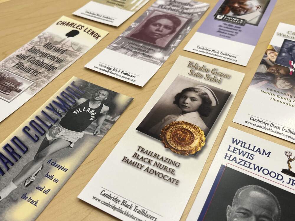 A closeup of some of the bookmarks designed by the Cambridge Black History Project, (Solon Kelleher/WBUR)