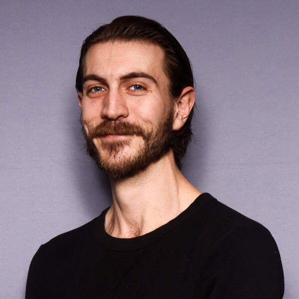 Headshot of J. Kyle White-Sullivan