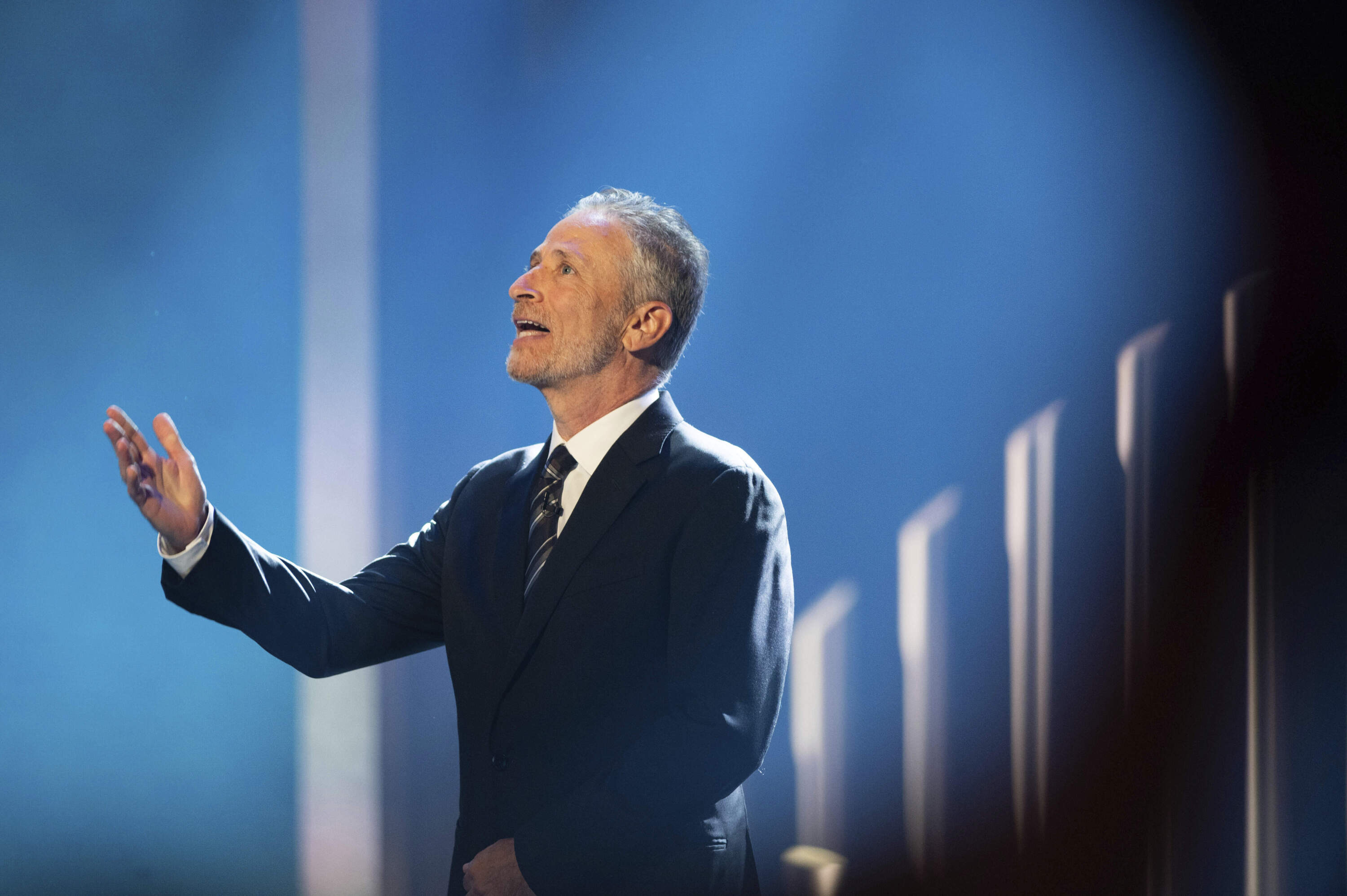 Jon Stewart is introduced at the start of the 23rd annual Mark Twain Prize for American Humor at the Kennedy Center for the Performing Arts on April 24, 2022, in Washington, D.C. (Kevin Wolf/AP)