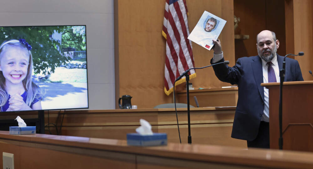 Senior Assistant N.H. Attorney General Benjamin Agati shows the jury a photograph of the defendant during closing arguments in Adam Montgomery's trial on Feb. 21 in Manchester, N.H. (Jim Davis/The Boston Globe via AP, Pool)