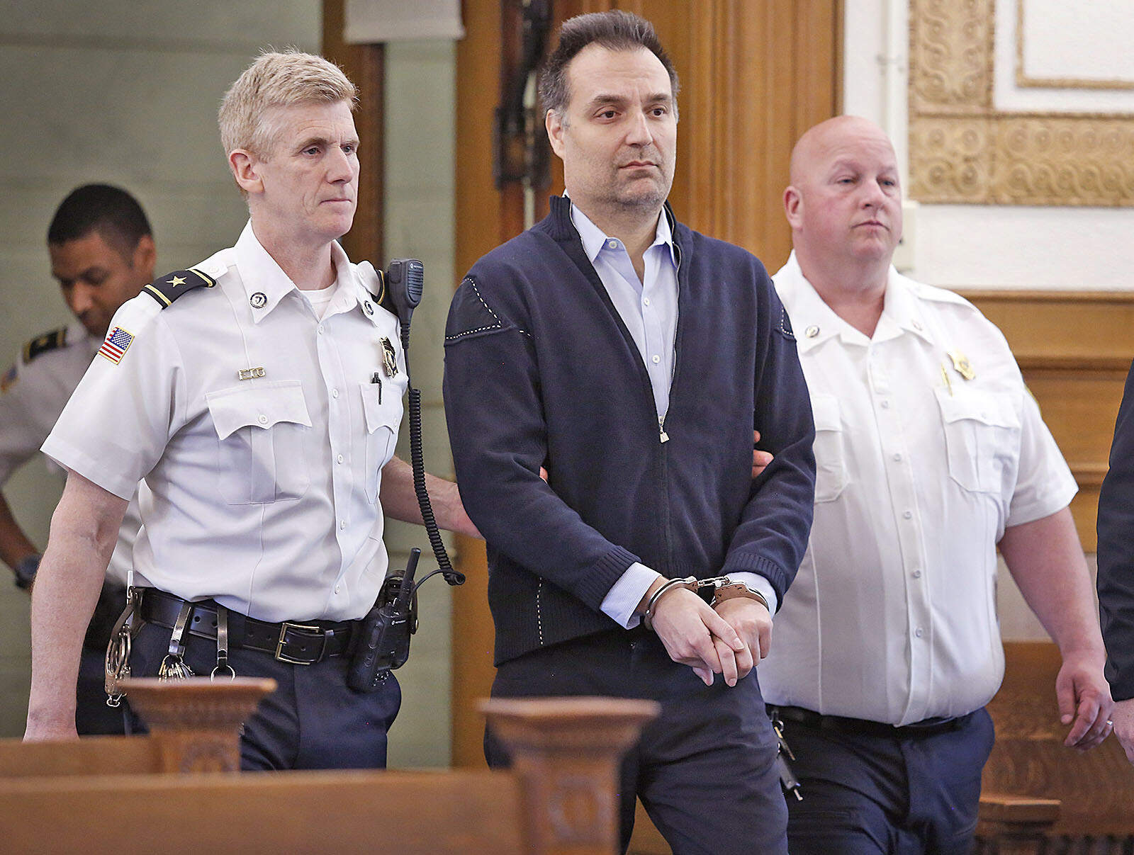 Brian Walshe enters the courtroom for his arraignment, April 27, 2023, in Dedham, Mass. (Greg Derr/The Patriot Ledger via AP)