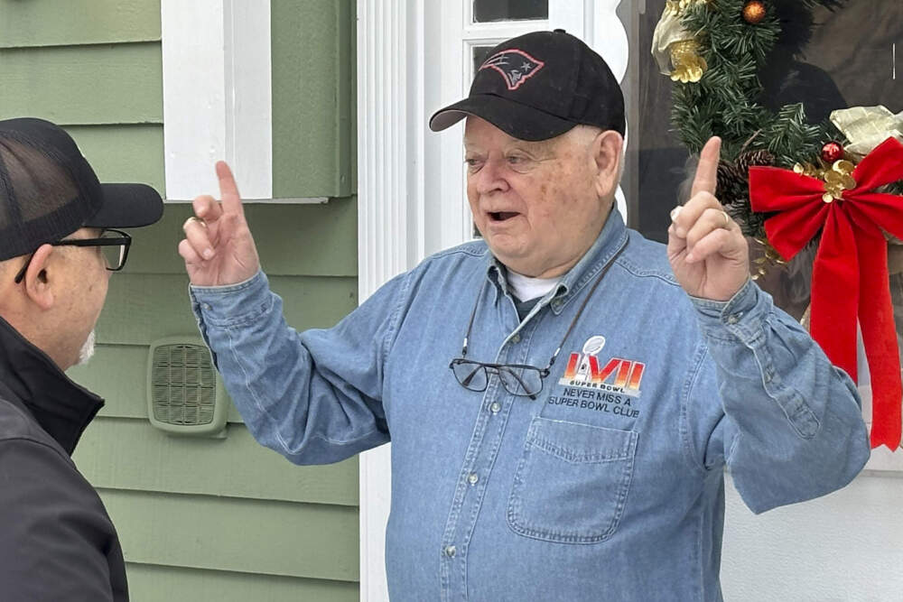 Don Crisman speaks with a visitor at his home in Kennebunk, Maine. (David Sharp/AP)