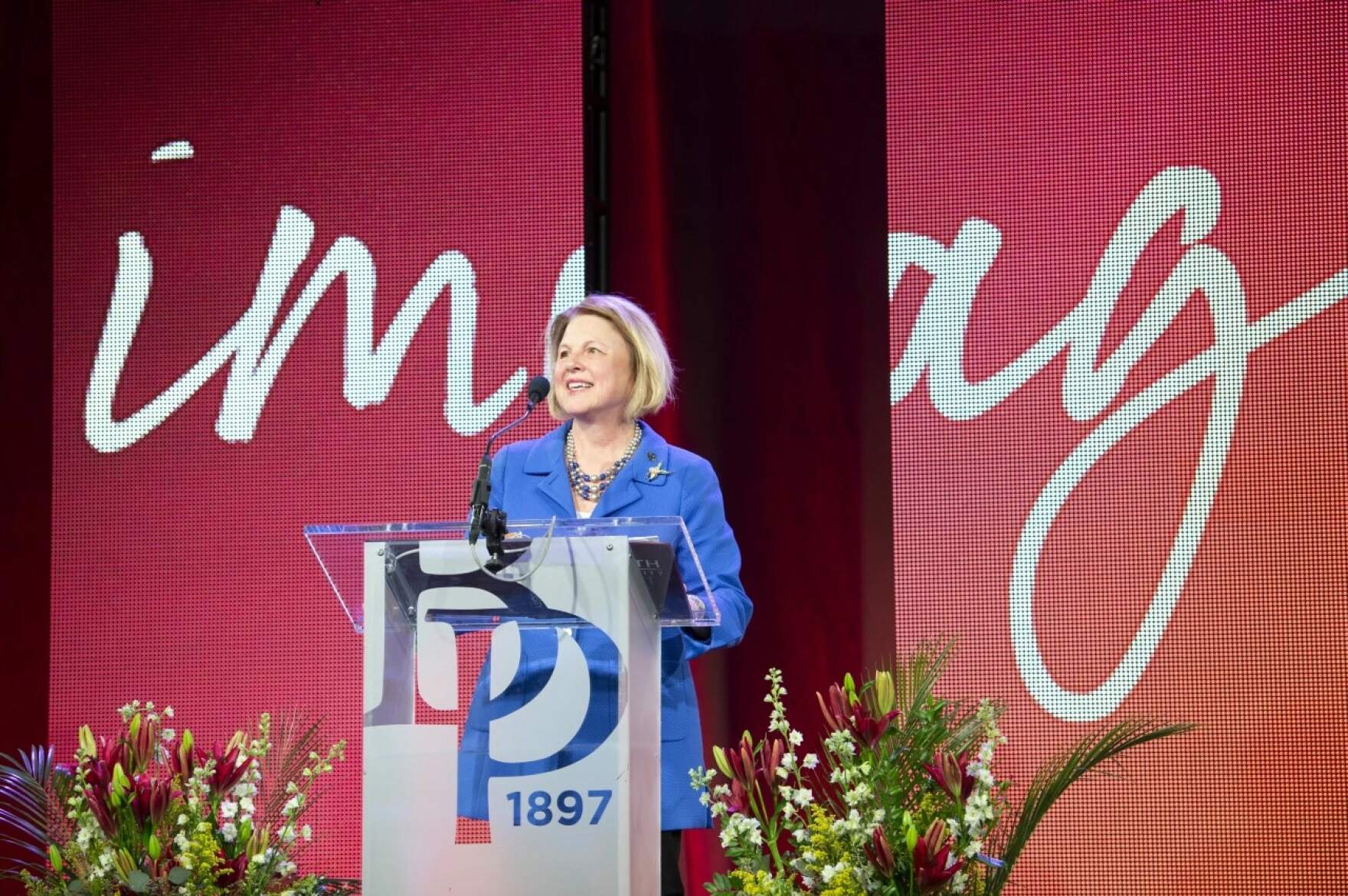 Bay Path University President Sandra Doran giving her remarks at the University's 25th Annual Women's Conference. (Courtesy of Bay Path University via NEPM)