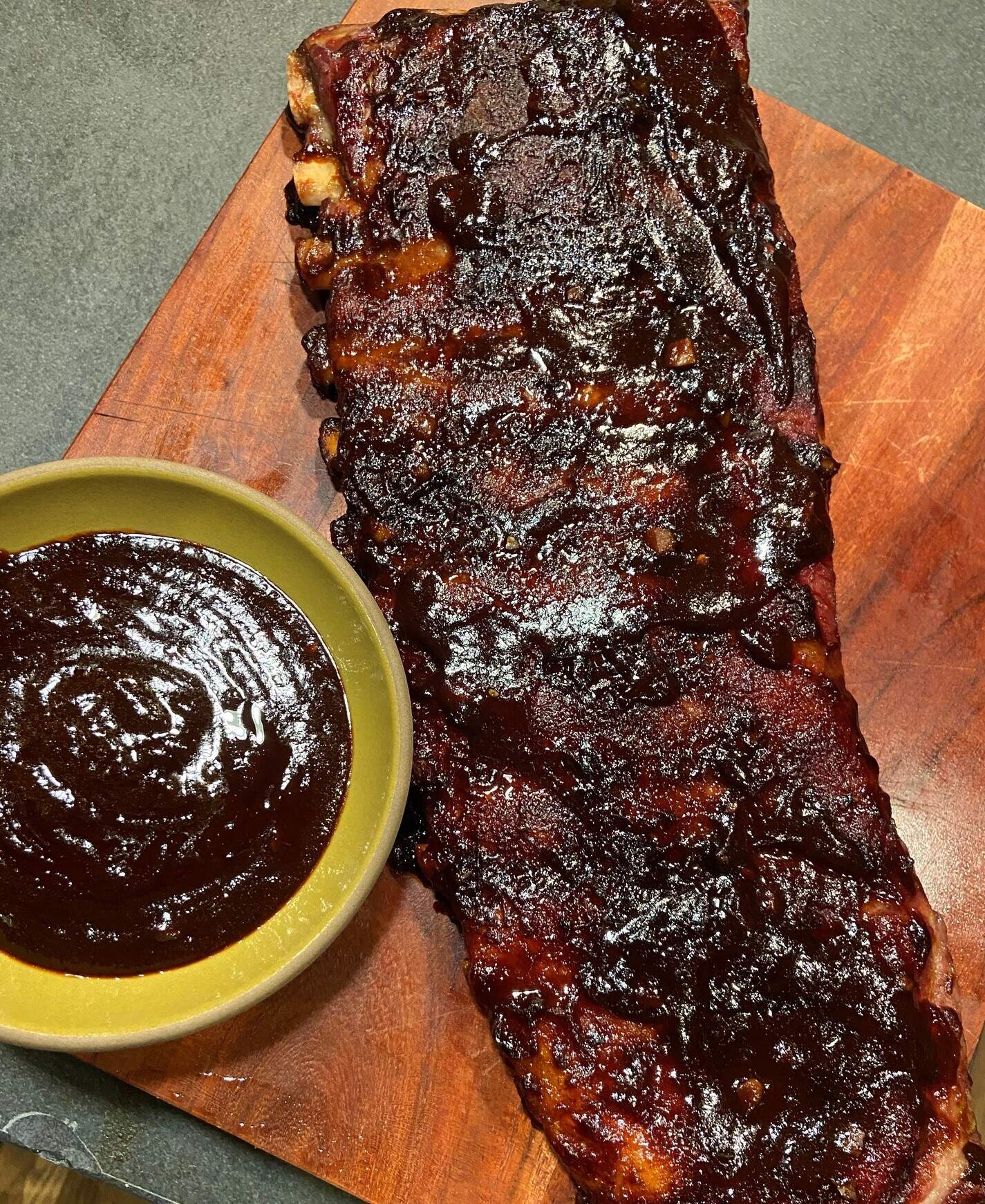 Kansas City-style ribs with BBQ sauce. (Kathy Gunst/Here &amp; Now)