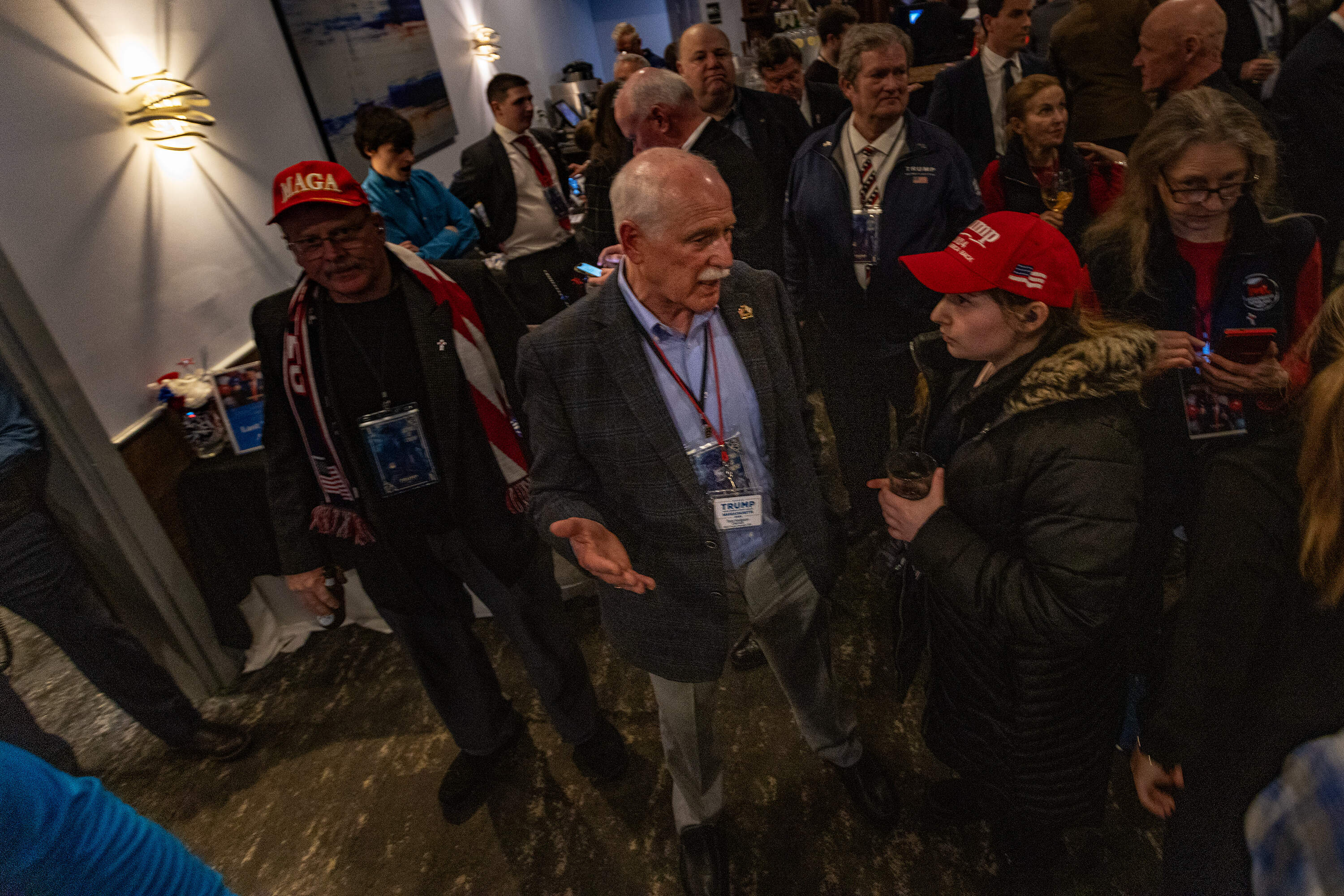 The chairman of former president Donald Trump's Massachusetts campaign Thomas Hodgson speaks with supports at an election watch party in Quincy. (Jesse Costa/WBUR)