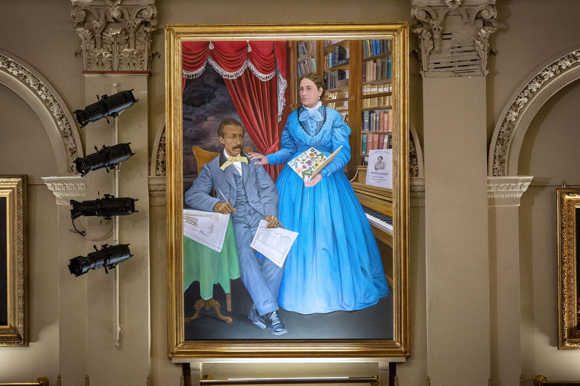 Artist Brenda Zlamany's portrait of William and Martha Brown at Mechanics Hall in Worcester. (Robin Lubbock/WBUR)