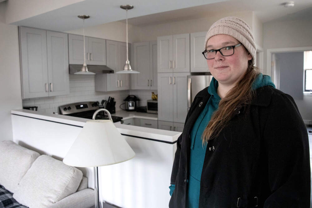 Army veteran Marissa Troupe in her new apartment in Boston's South End. (Robin Lubbock/WBUR)