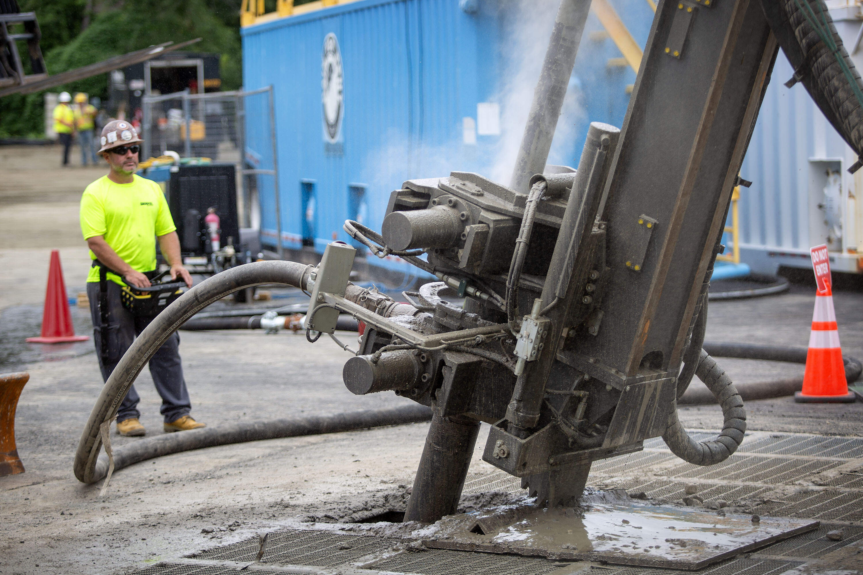 A drilling crew bores a geothermal well for Eversource's networked geothermal project in Framingham. (Robin Lubbock/WBUR)
