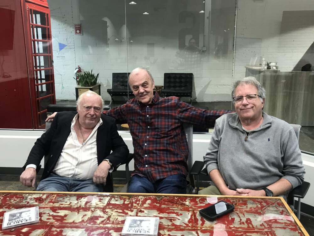Myles Connor, Al Dotoli and Bruce Macomber at the David Bieber Archives’ Norwood warehouse. (Noah Schaffer for WBUR)