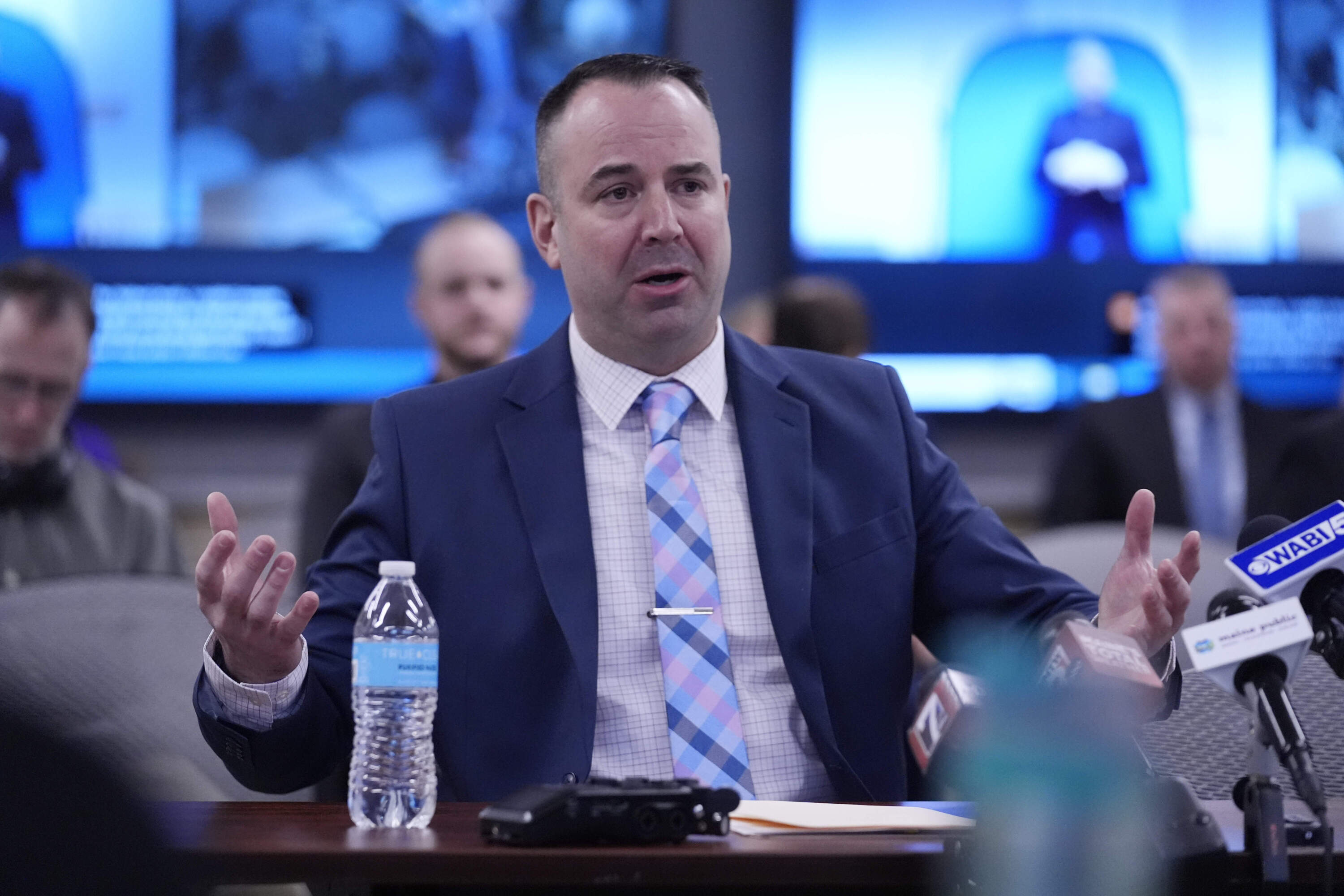 Deputy Matthew Noyes of the Androscoggin County Sheriff's Office gives testimony March 7, in Augusta, Maine, during a hearing of the independent commission investigating the law enforcement response to the mass shooting in Lewiston. (Robert F. Bukaty/AP)