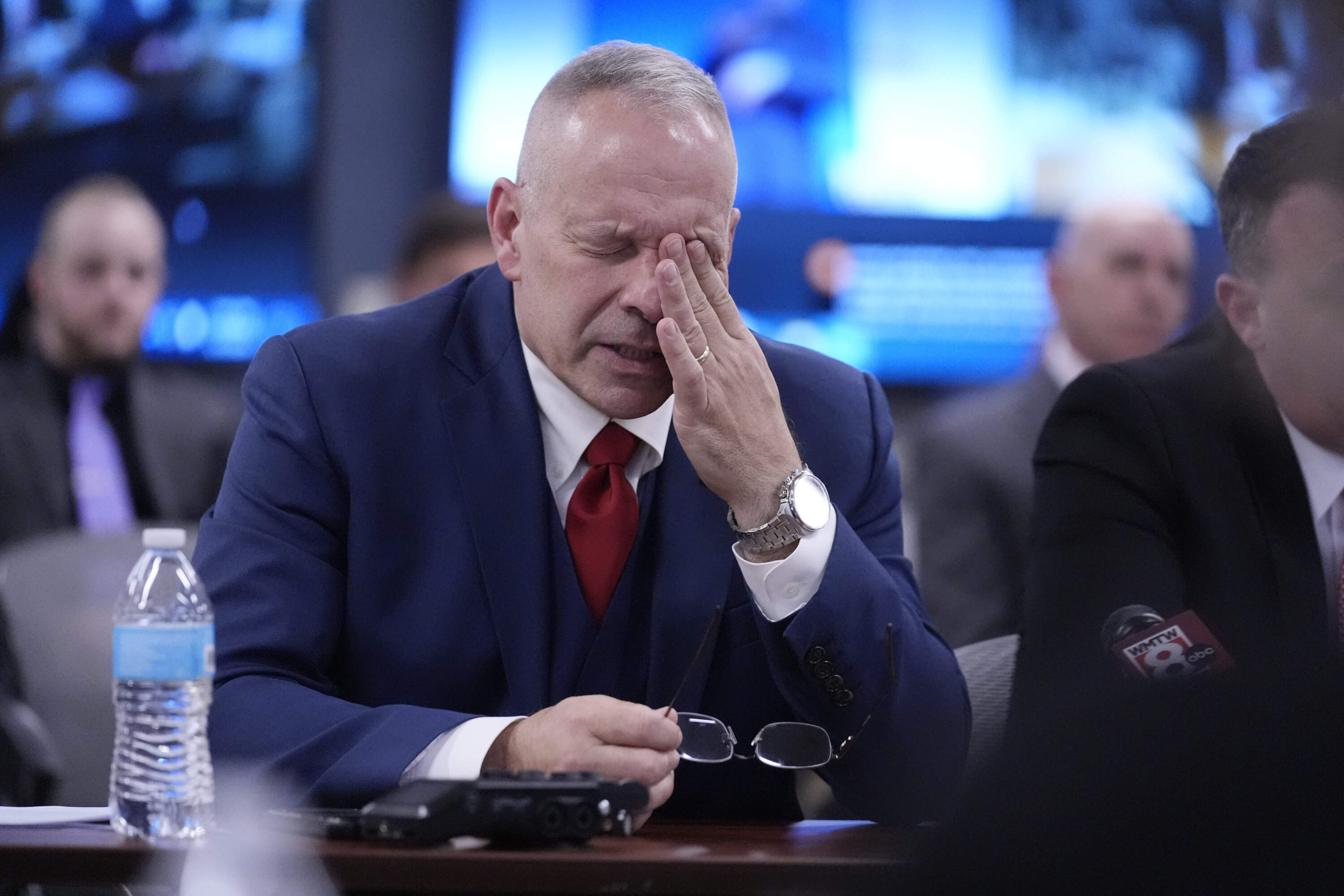Army Reserve First Sgt. Kelvin Mote reacts while talking about the moment he heard about the mass shooting in Lewiston, during a hearing of the independent commission investigating the law enforcement's response. (Robert F. Bukaty/AP)