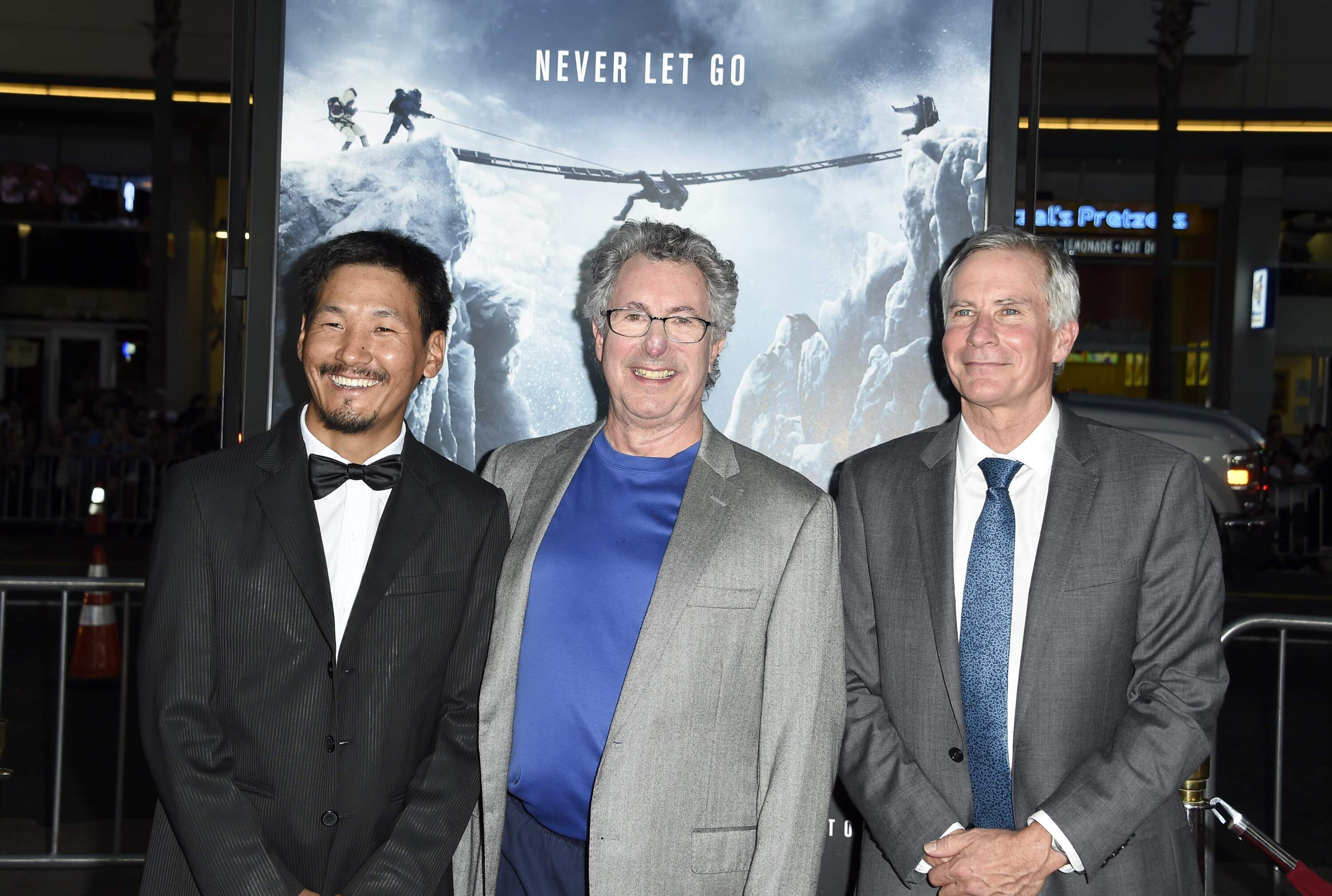 Dr Beck Weathers (C), who survived a Mount Everest expedition, Mount Everest guide Ang Phula Sherpa (L), and US mountaineer and filmmaker David Breashears (R) attend the premiere of Universal Pictures' "Everest," September 9, 2015 at the TCL Chinese Theatre in Hollywood, California. (Robyn Beck/AFP via Getty Images)