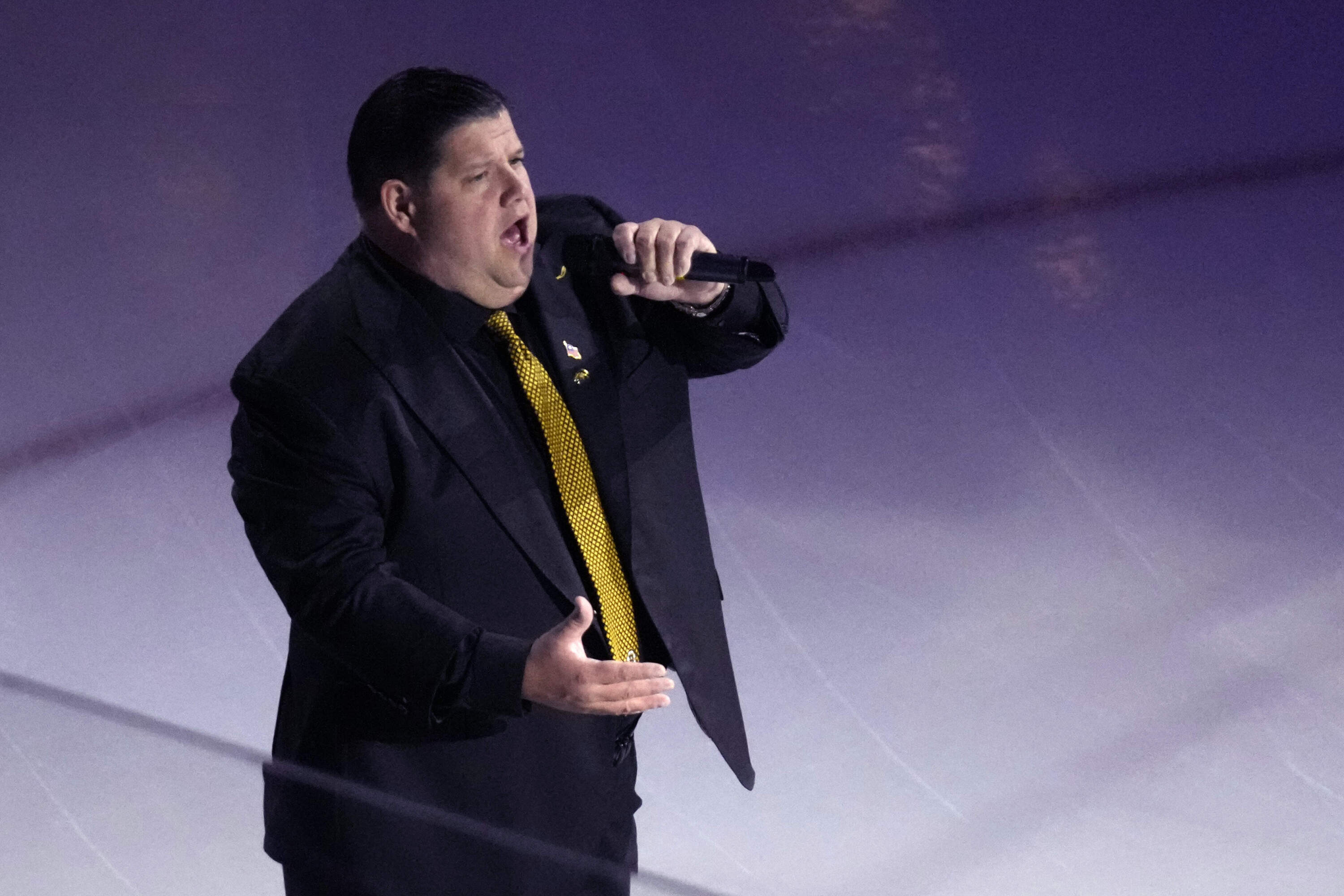 Boston Bruins anthem singer Todd Angilly performs prior to an NHL hockey game, Wednesday, Jan. 24, 2024. (Charles Krupa/AP)