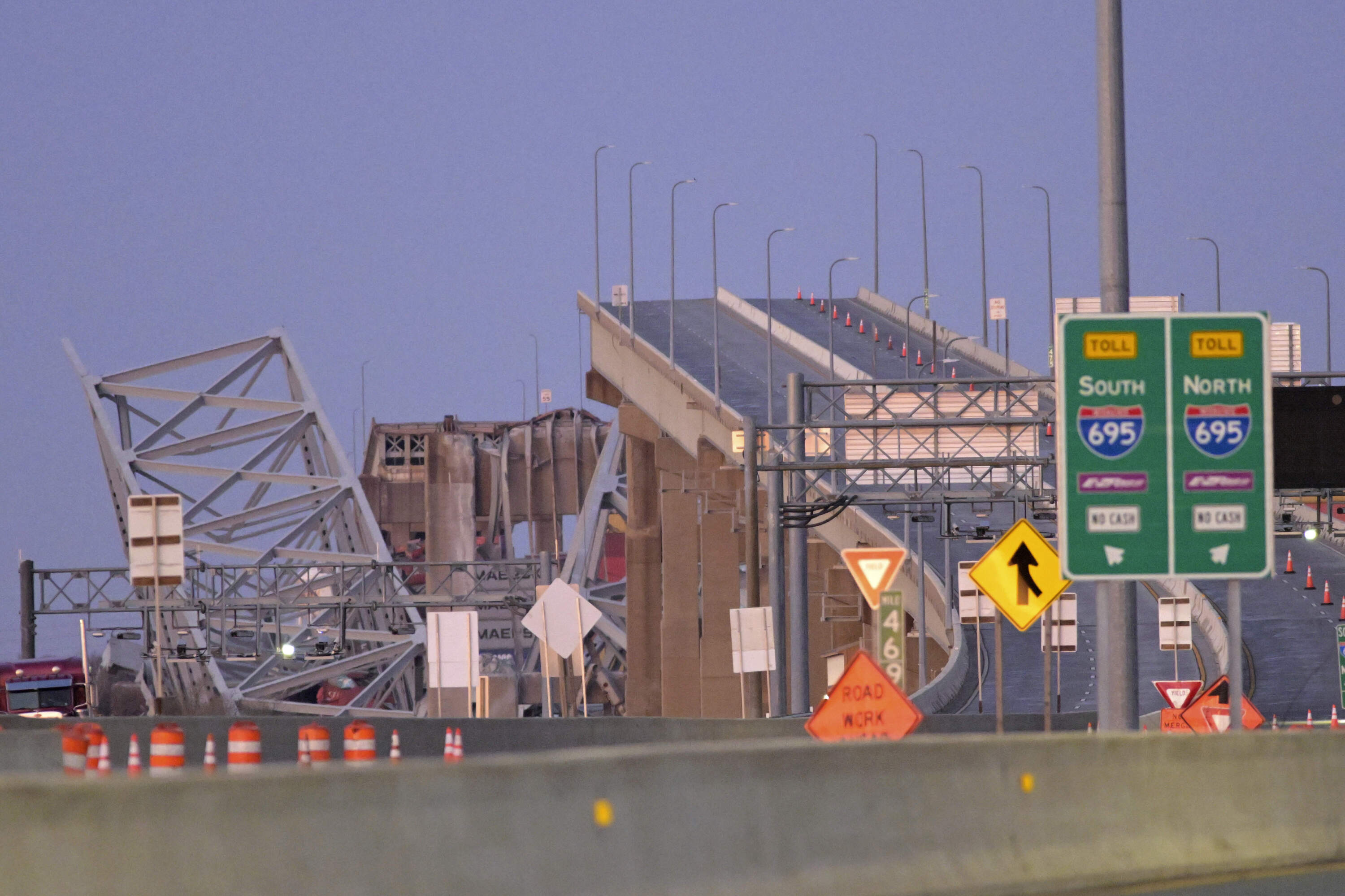 Parts of the Francis Scott Key Bridge remain after a container ship collided with a support Tuesday, March 26, 2024 in Baltimore. (Steve Ruark/AP)