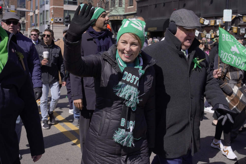 Massachusetts Gov. Maura Healey, center, waves to spectators while marching in the St. Patrick's Day parade, Sunday, March 19, 2023. (Steven Senne/AP)
