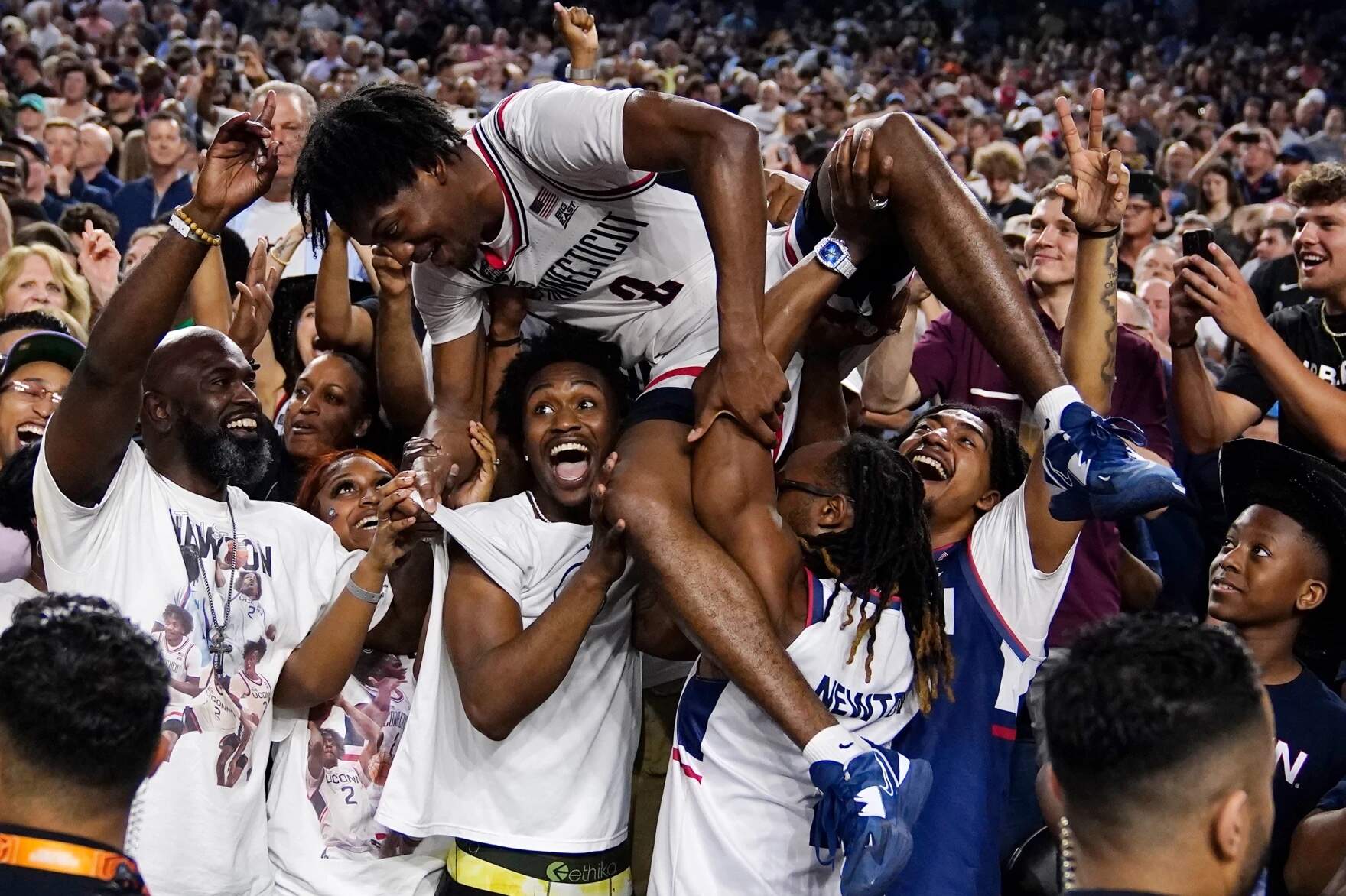 Connecticut guard Tristen Newton celebrates after their win against San Diego State during the men's national championship college basketball game in the NCAA Tournament on Monday, April 3, 2023, in Houston. (Brynn Anderson/AP)
