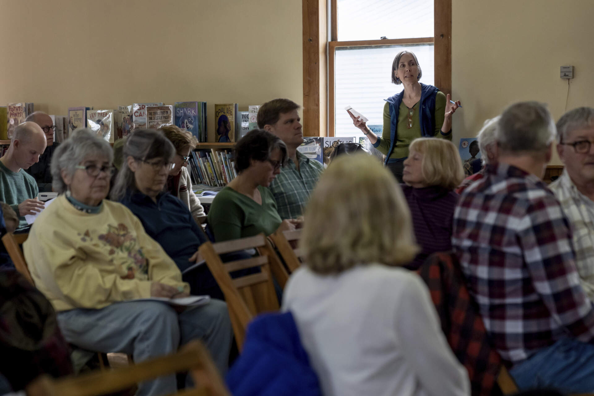 Julie Bomengen speaks during the annual Town Meeting to advocate for an extra $500 in the town's budget for the Lamoille Community Food Share. (David Goldman/AP)