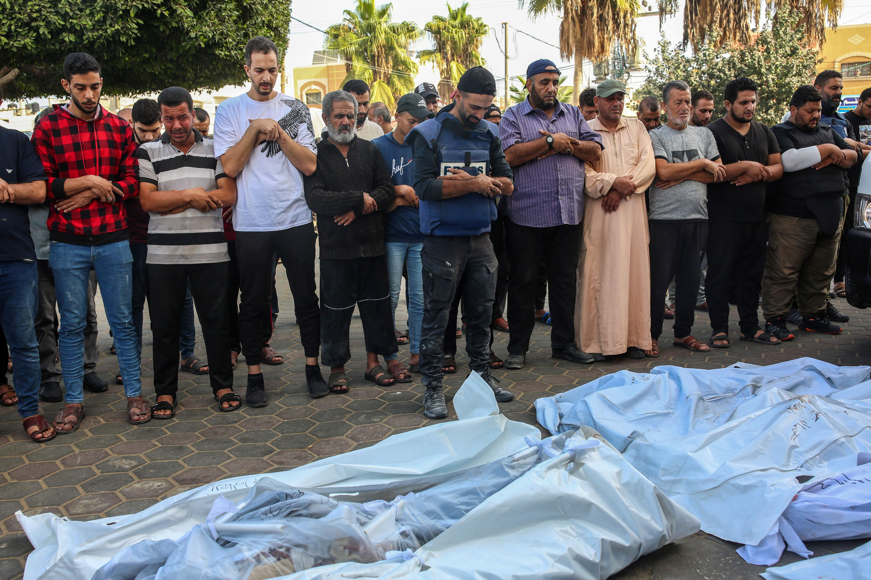Gazans mourn. (Samar Abu Elouf/New York Times)
