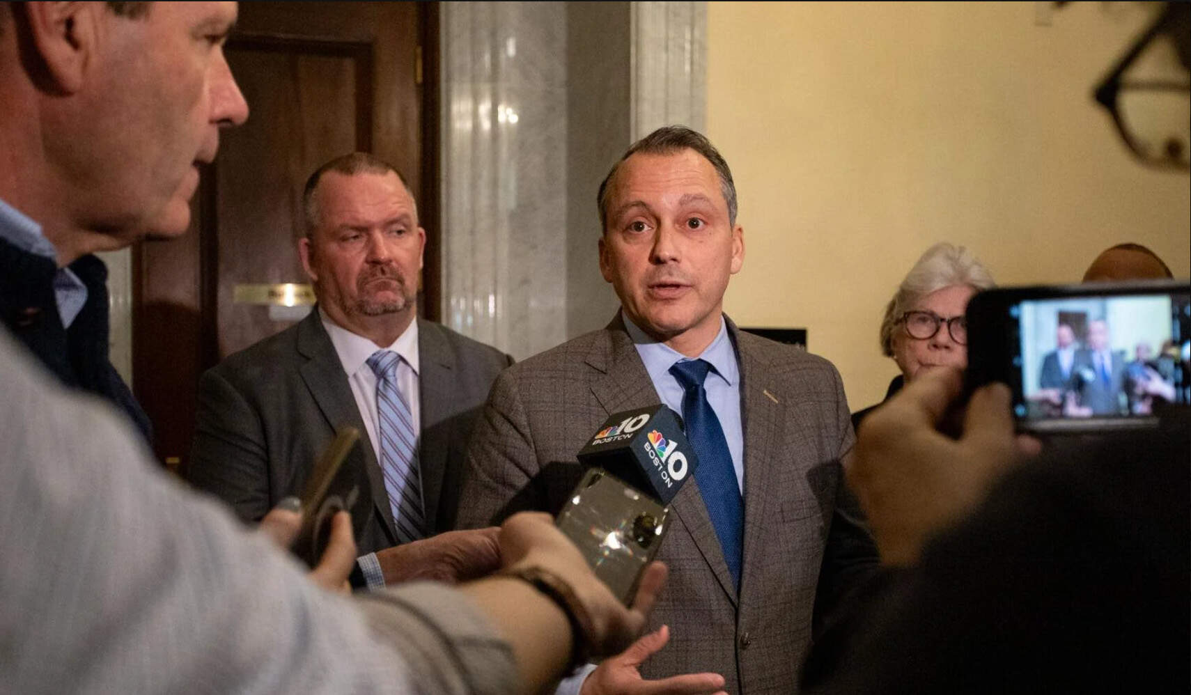 House Ways and Means Chairman Aaron Michlewitz talks to reporters after a Democratic caucus on Wednesday. (Sam Doran/SHNS)