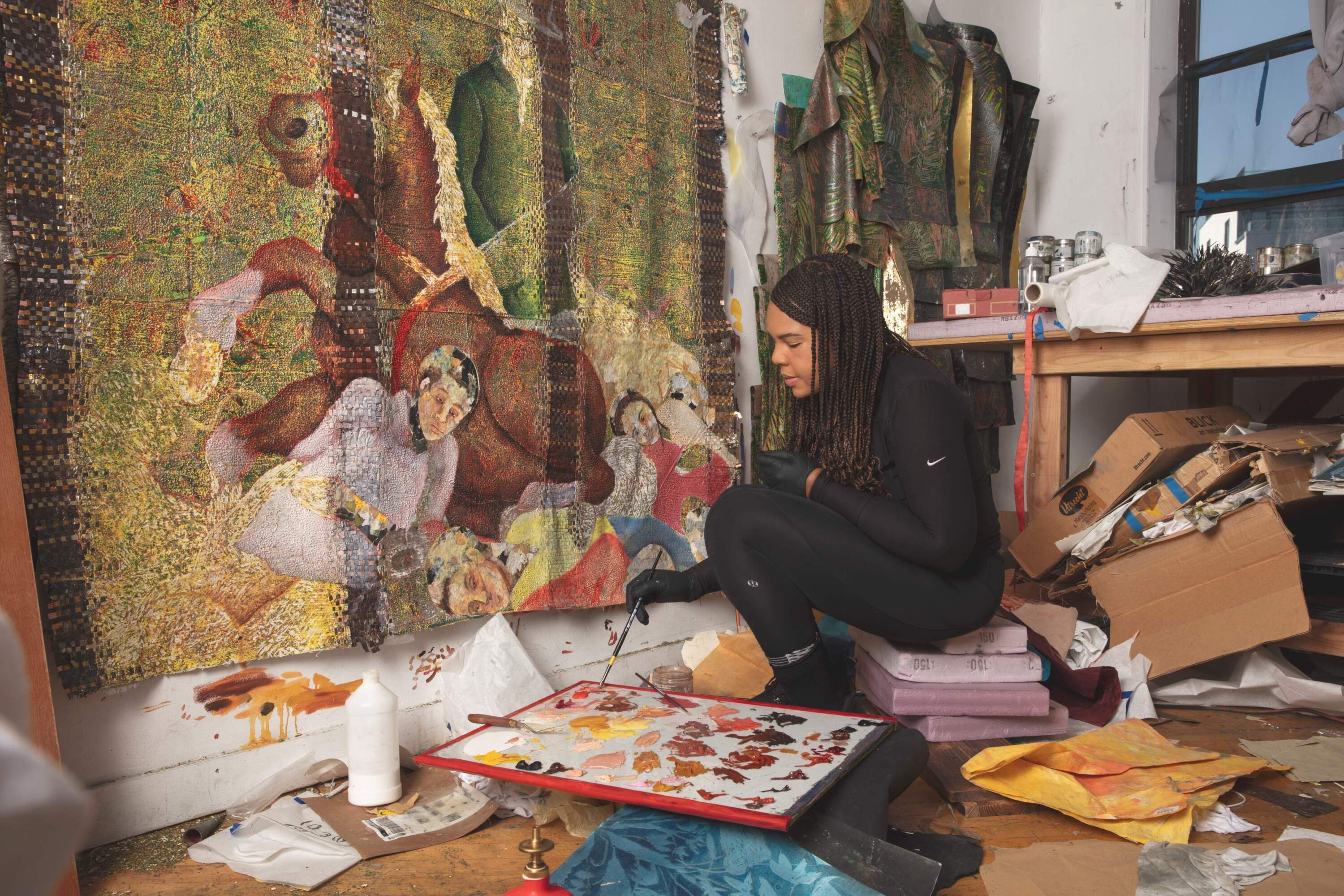 Kathia St. Hilaire at work in her studio. (Courtesy of the artist and Perrotin; Pphoto by Guillaume Ziccarelli)