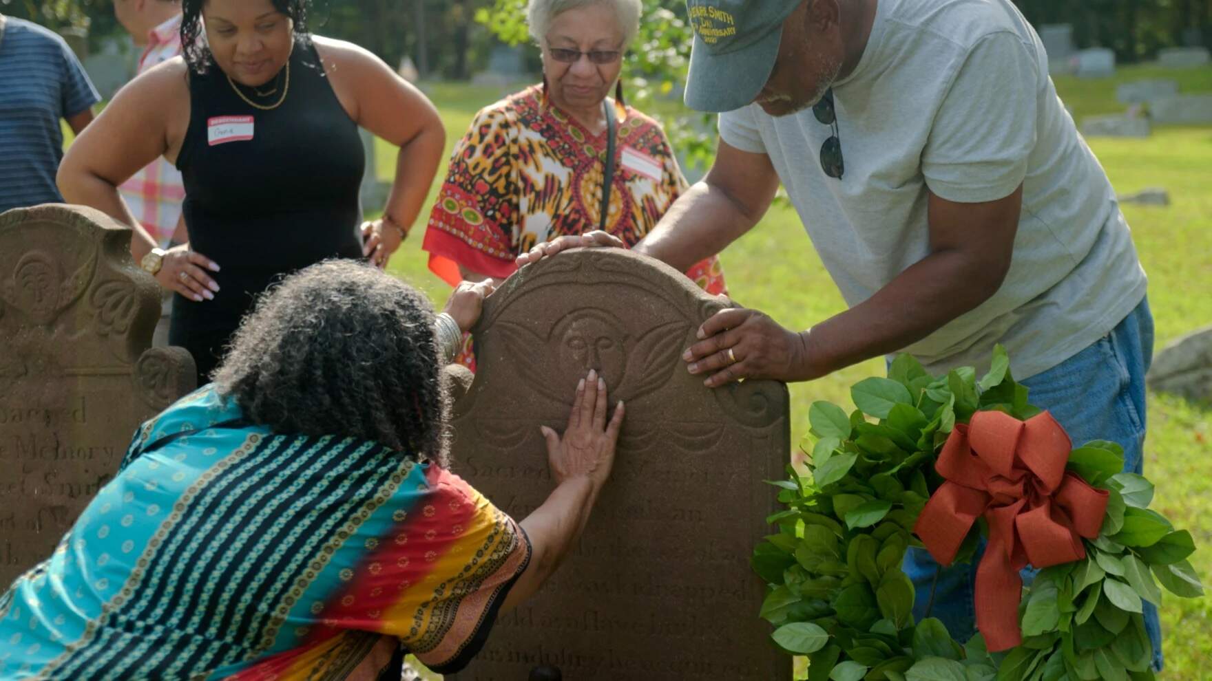 Descendants of Venture Smith pay tribute at his gravestone in East Haddam, Conn. at the 27th Annual Venture Smith Day on September 9, 2023. (Ryan Caron King/Connecticut Public)