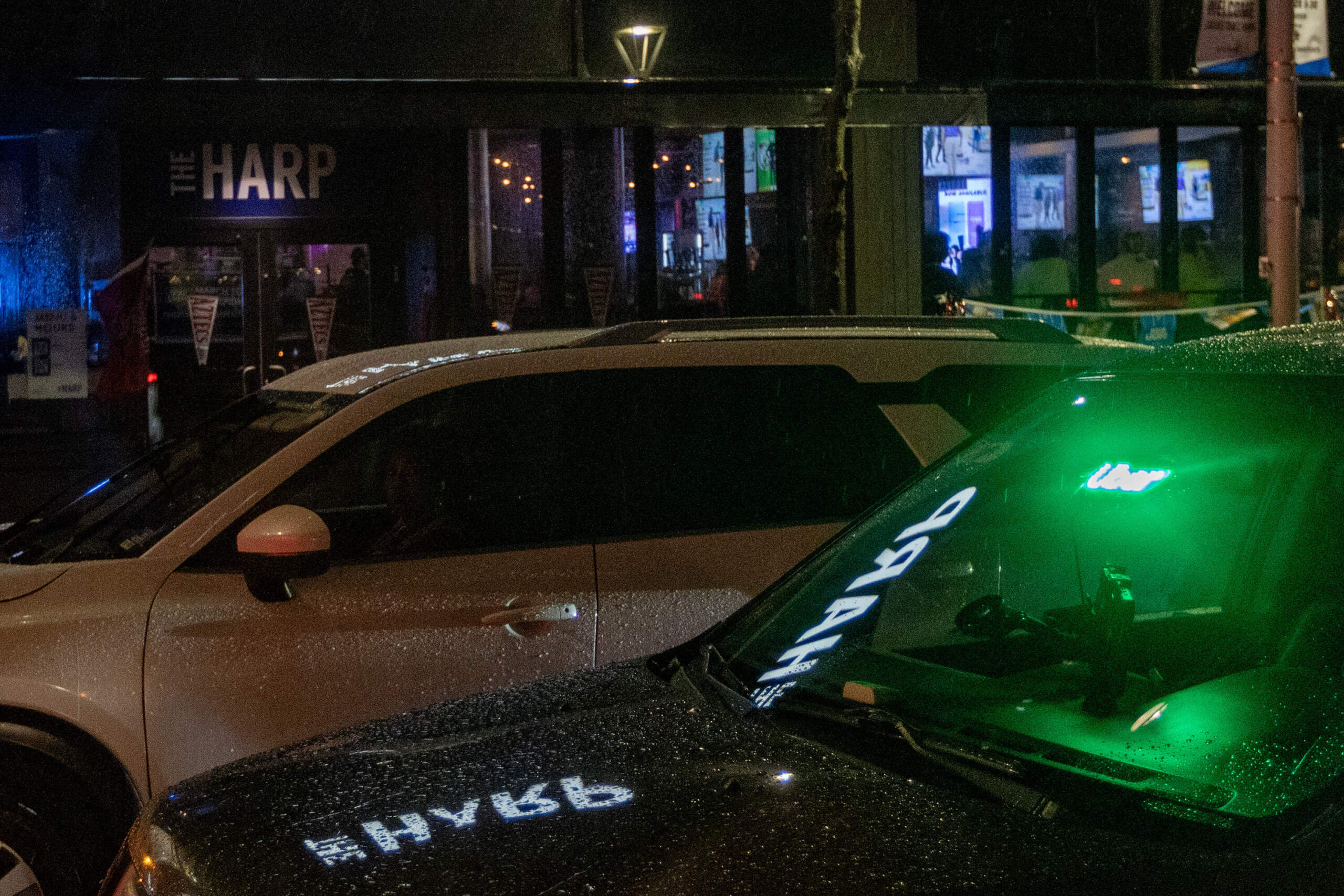 Prosecutors have accused Alvin Campbell of posing as an Uber driver to pick up women outside popular Boston bars. In this image, an Uber passes the Harp on Causeway Street. (Jesse Costa/WBUR)