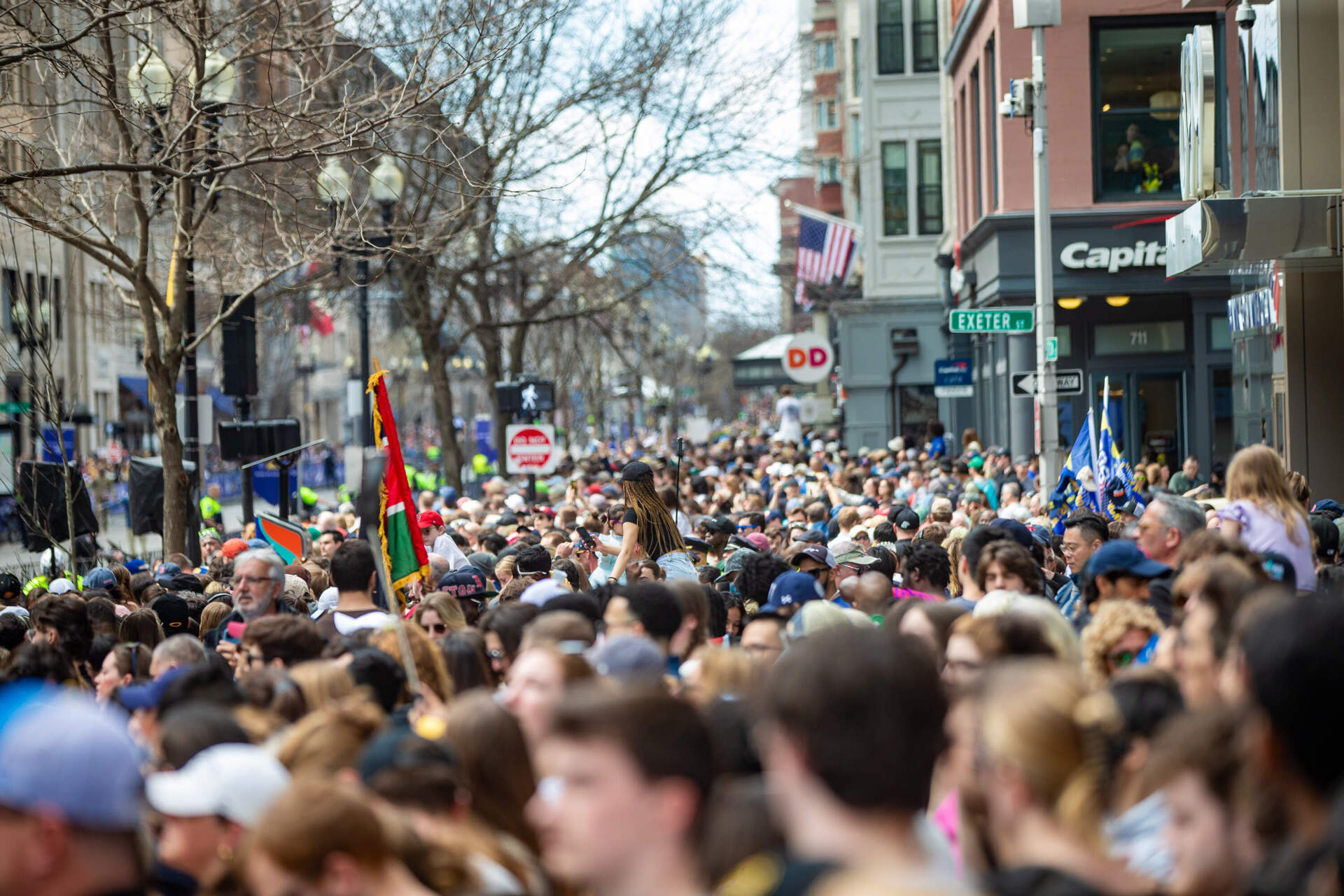 The crowd at the finish line on Boylston Street for the Boston Marathon. (Jesse Costa/WBUR)