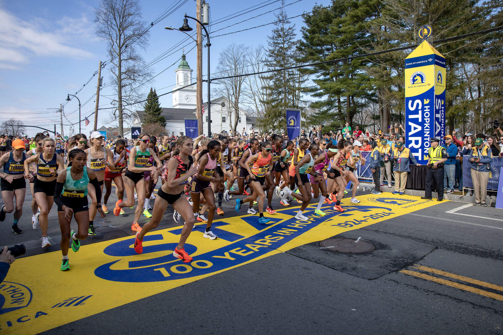 The professional women's race gets under way at the start of the 2024 Boston Marathon in Hopkinton. (Robin Lubbock/WBUR)