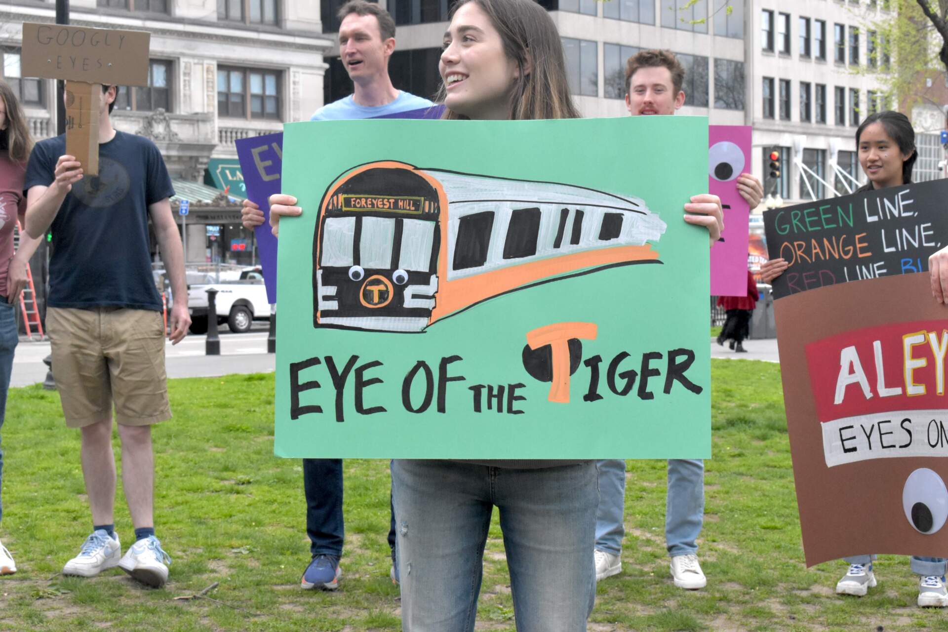About 20 people gathered on Boston Common to call for the MBTA to put large googly eyes on the front of the trains. (Meghan B. Kelly/WBUR)