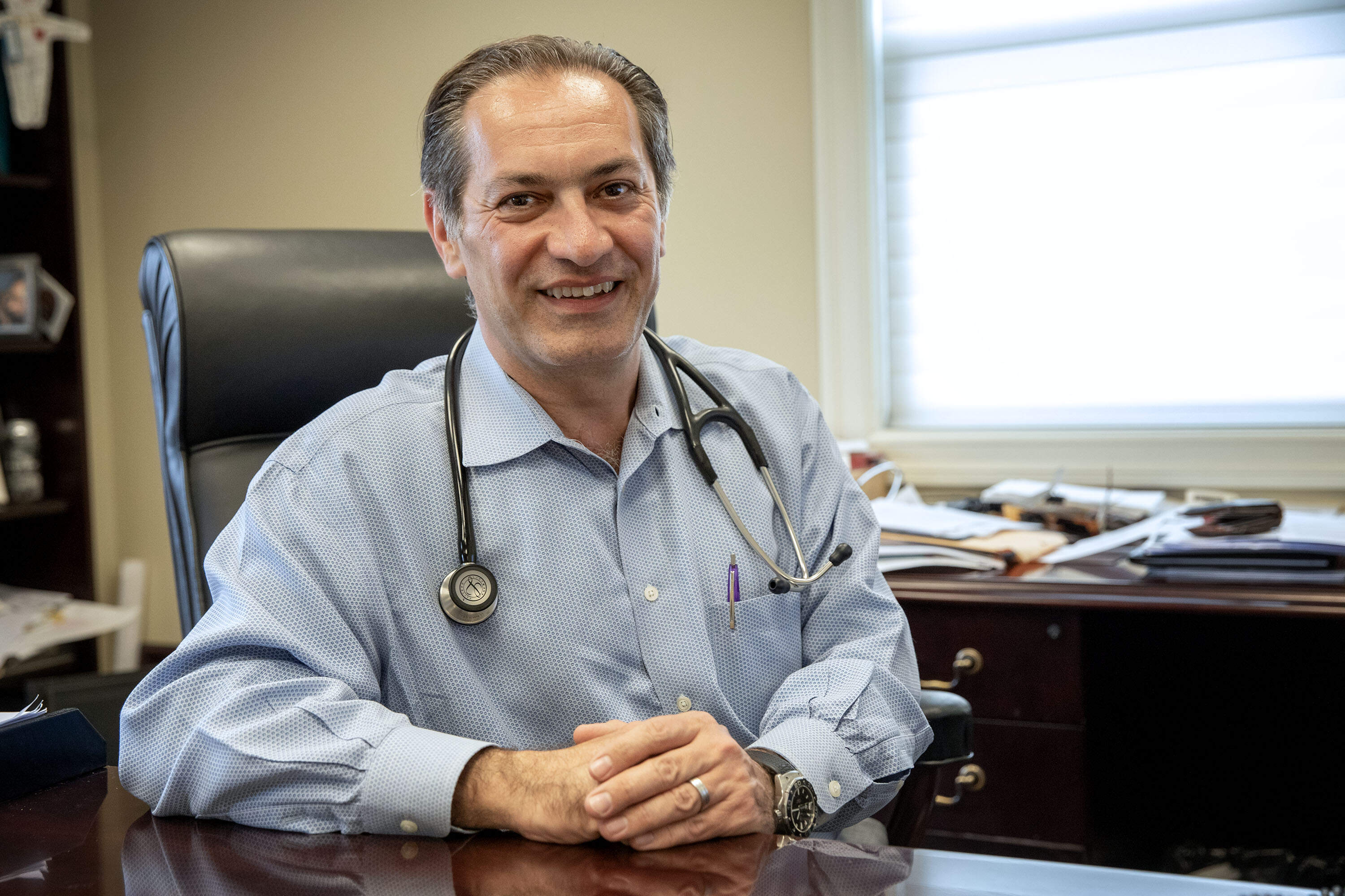 Dr. Vartan Yeghiazarians, at his clinic in Methuen. (Robin Lubbock/WBUR)