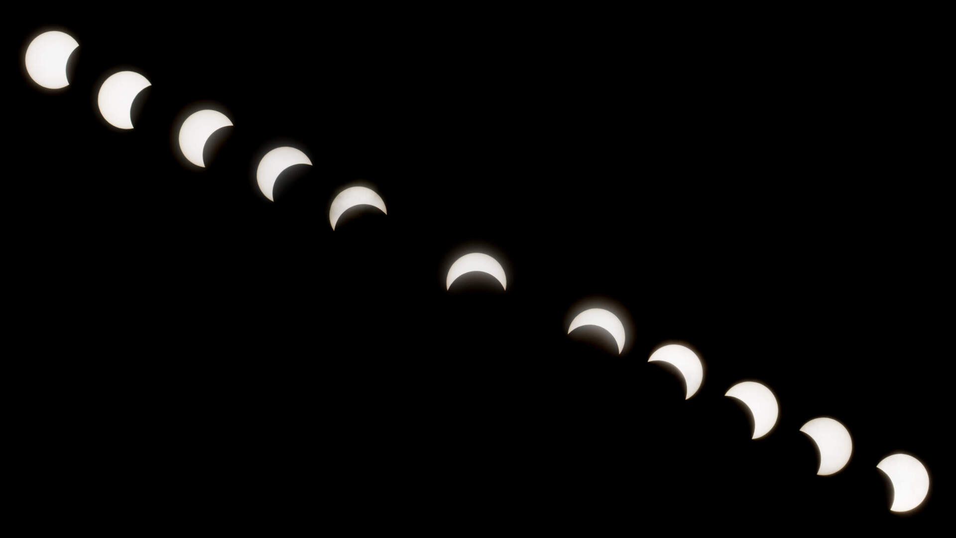 Interval of the partial solar eclipse viewed from Copley Square in Boston on Aug. 21, 2017. (Jesse Costa/WBUR)