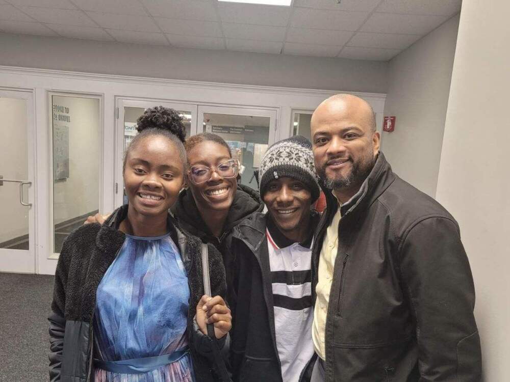 Hananiah Pierre-Louis, right, with relatives, Wood Peter Georges, Keren Cezar and Rode Doly. (Courtesy Hananiah Pierre-Louis)
