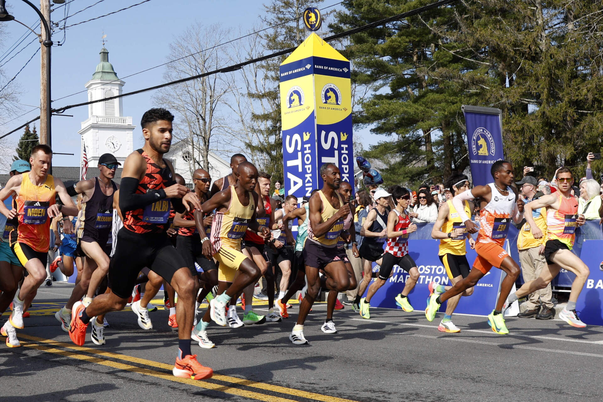 Elite men's field break from the start line of the Boston Marathon in Hopkinton. (Mary Schwalm/AP)