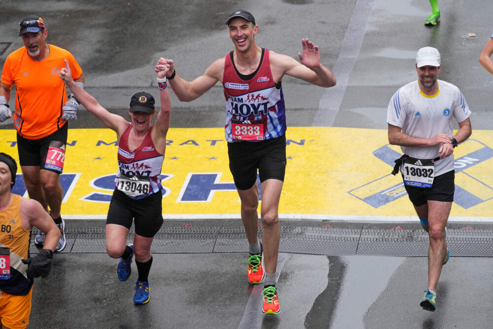 Zdeno Chára (3333) crosses the finish line of the Boston Marathon, Monday, April 17, 2023. (Charles Krupa/AP)