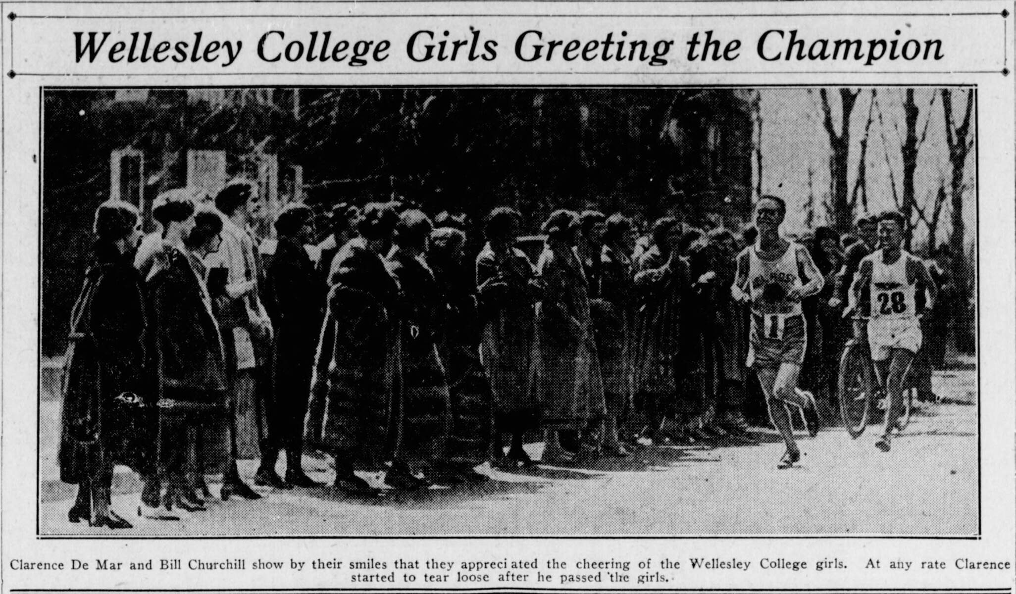 In perhaps an early version of the "Wellesley scream tunnel," Wellesley College students cheer on marathoners in this photo from the April 20, 1924 Boston Sunday Post. (Boston Public Library)