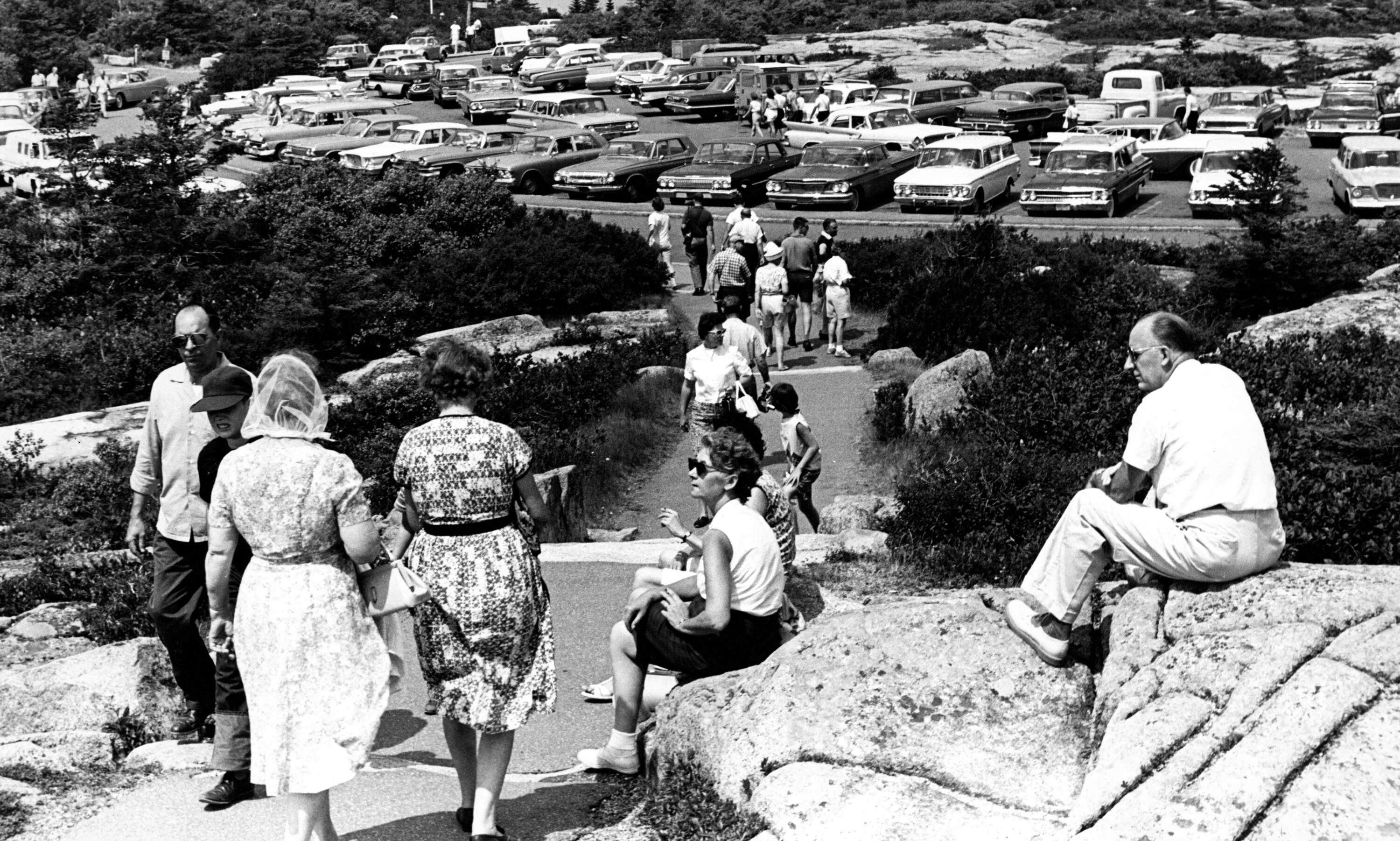 Cars pack the parking area at Mount Cadillac in Bar Harbor, Maine, to view the total solar eclipse on July 21, 1963. (Paul J. Maguire/The Boston Globe via Getty Images)