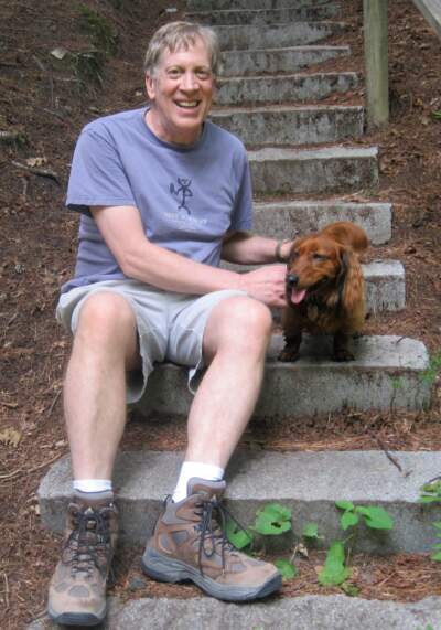 Ken Bader and his dog JoJo on their daily walk in woods of Littleton, New Hampshire in August 2014. (Courtesy Lisa Mullins)