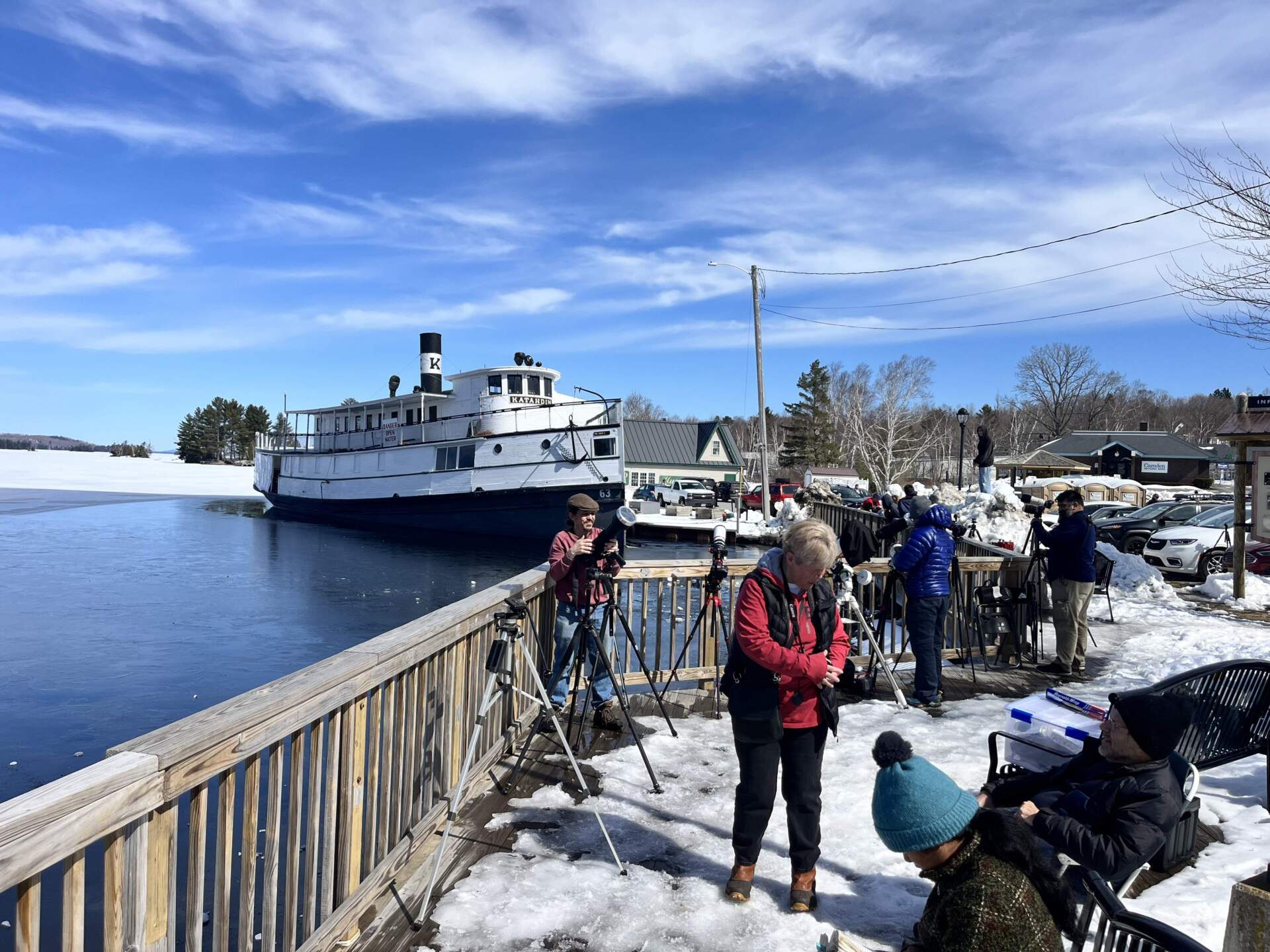 Viewers get set up in prime spots on Moosehead Lake in Greenville, Maine. (Esta Pratt-Kielley/Maine Public)