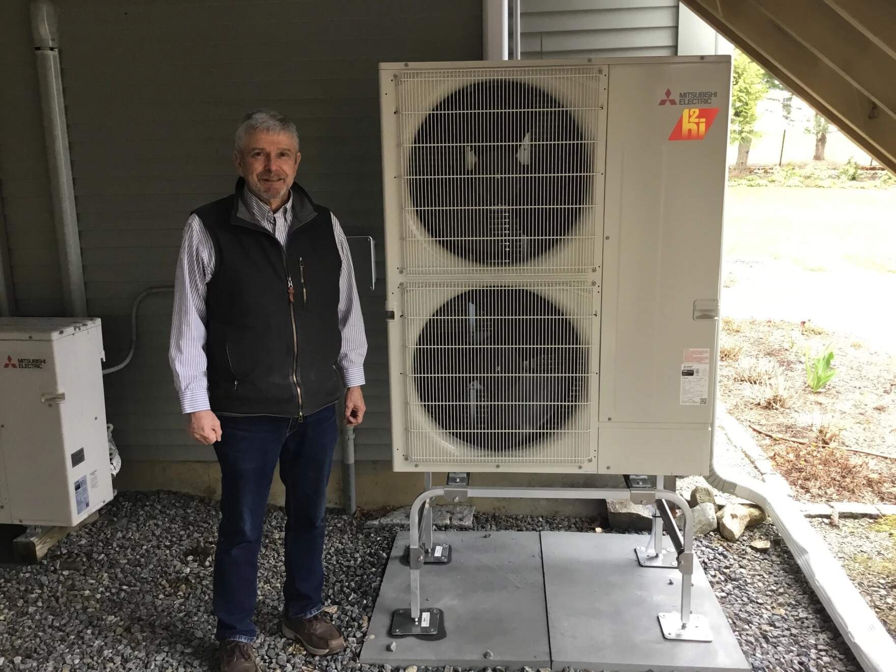 Tim Riley is a Peterborough resident who installed a heat pump with help from the PREP team during a pilot program. He and his wife installed the heat pump because they wanted to do what they could as individuals to mitigate climate change. But the system has additional benefits, he said. “We love the system,” he said. “It’s so quiet.” (Bob Haring-Smith)