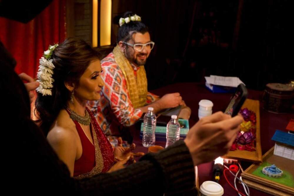 Anjali Bhimani and Omar Najam on the set of "DesiQuest." (Courtesy)