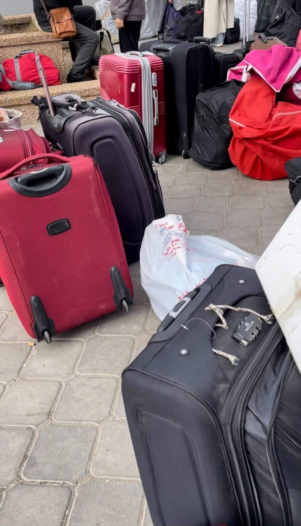 Nisreen Shehade's suitcases at the Rafah border crossing when she evacuated Gaza. (Courtesy of Nisreen Shehade)