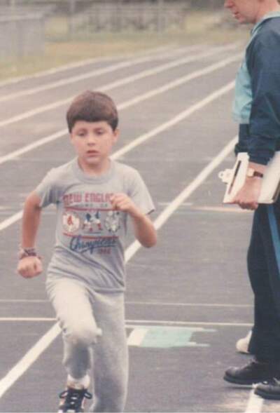 The author during his first race — two laps around the high school track for a community event in 1988. (Courtesy Jason Clemence)