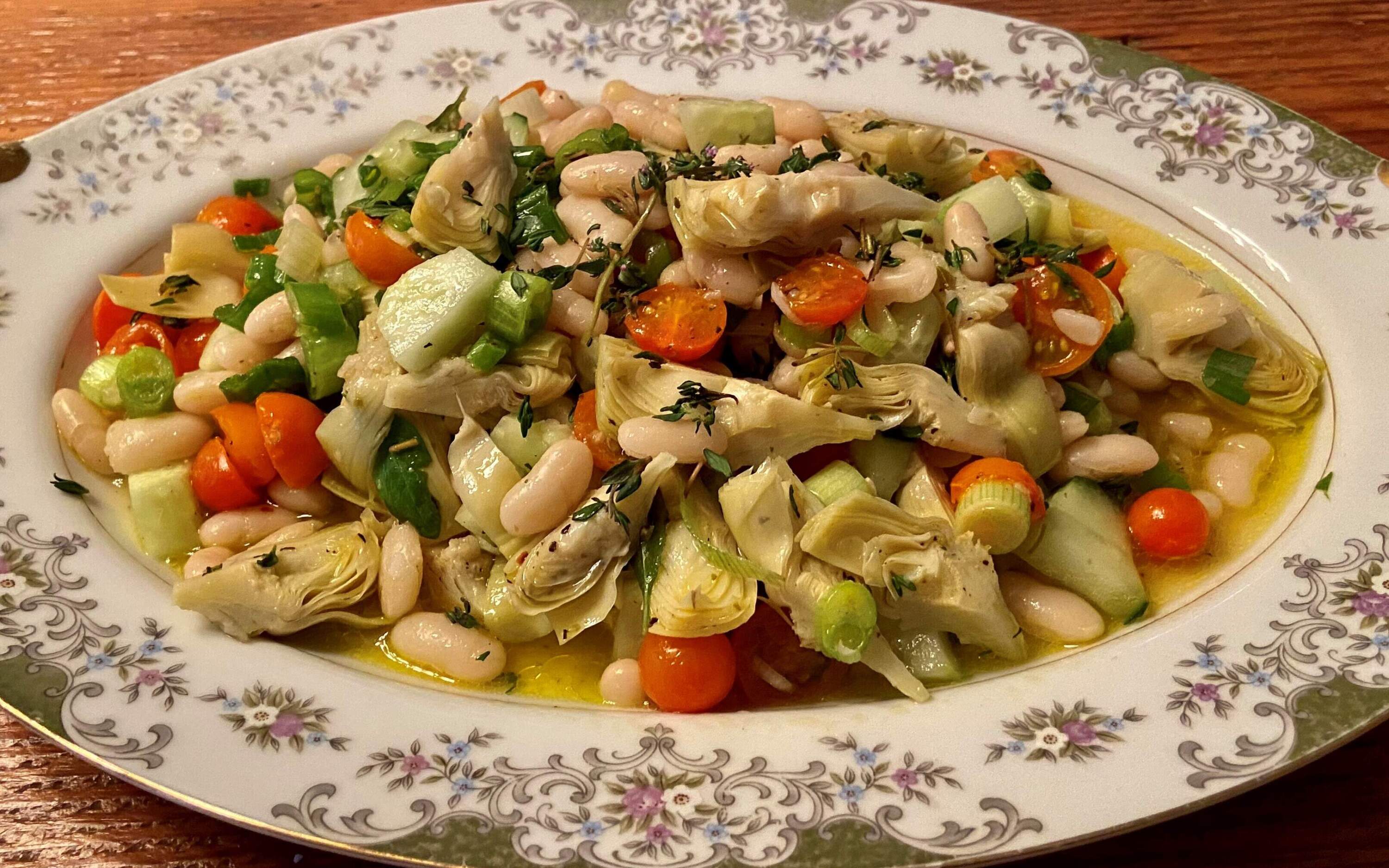 Spring white bean and artichoke salad with spring greens. (Kathy Gunst/Here &amp; Now)