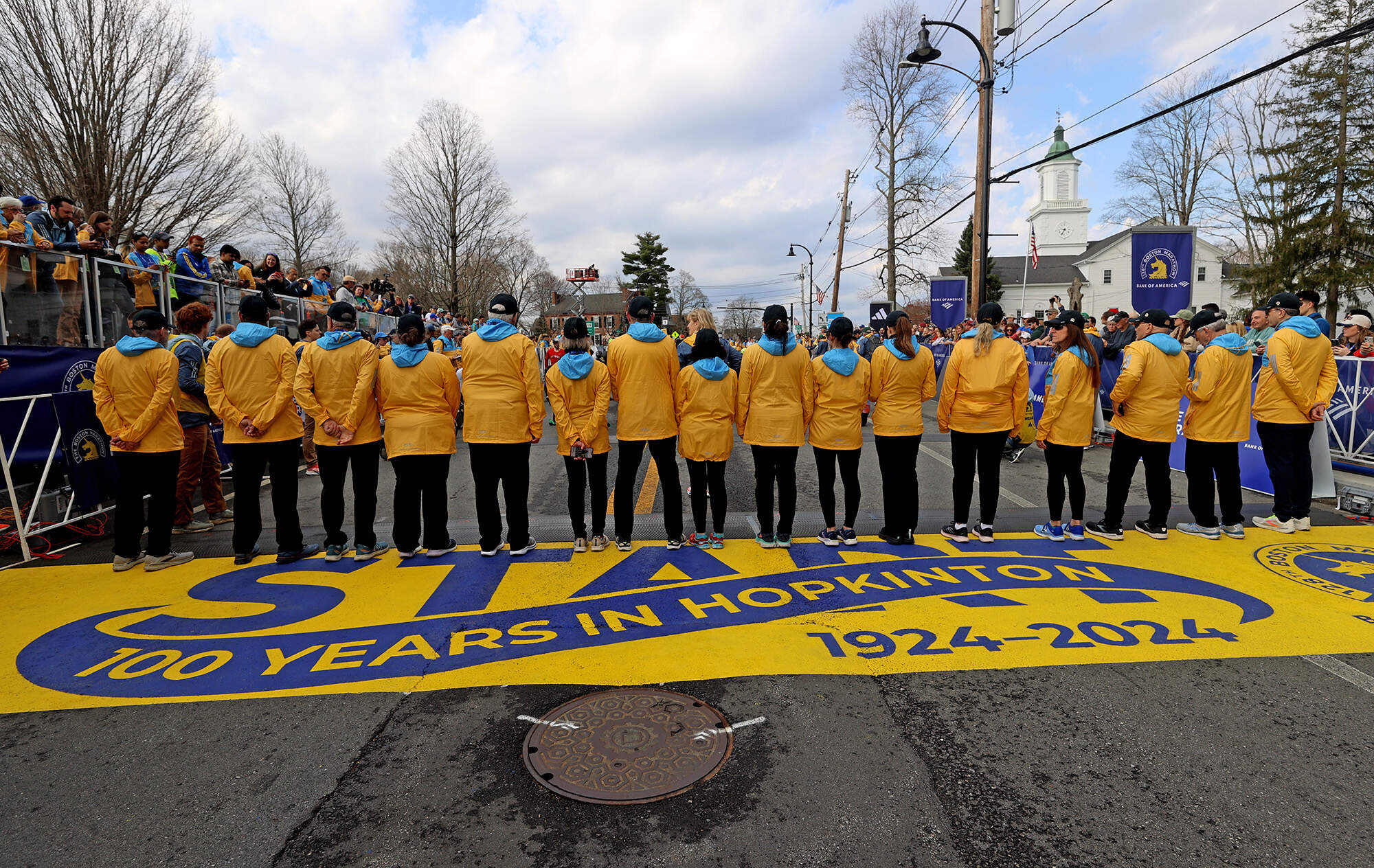 A group of volunteers at the starting line. (David L. Ryan/The Boston Globe via Getty Images)