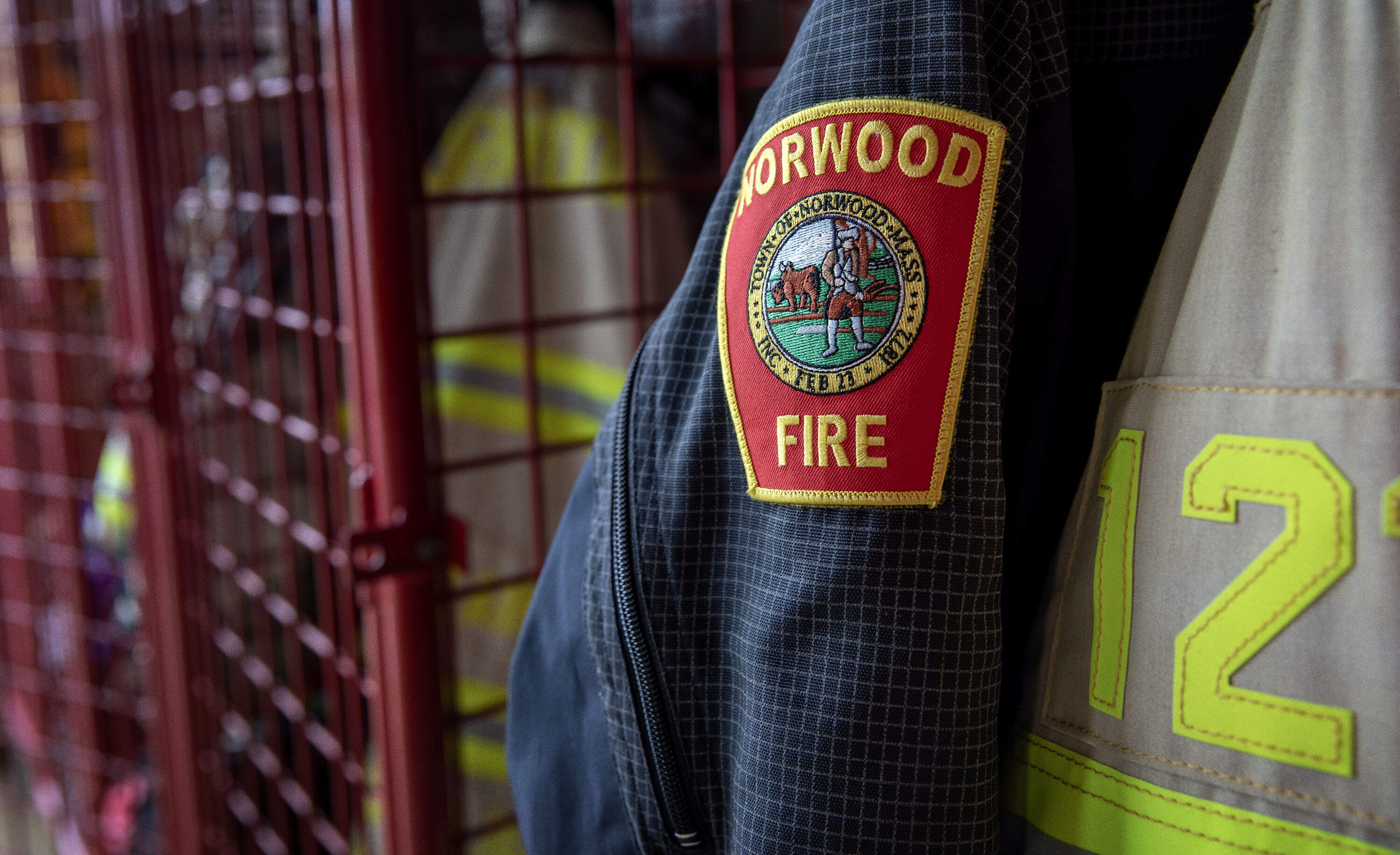 A Norwood firefighter's jacket in a fire station locker. (Robin Lubbock/WBUR)