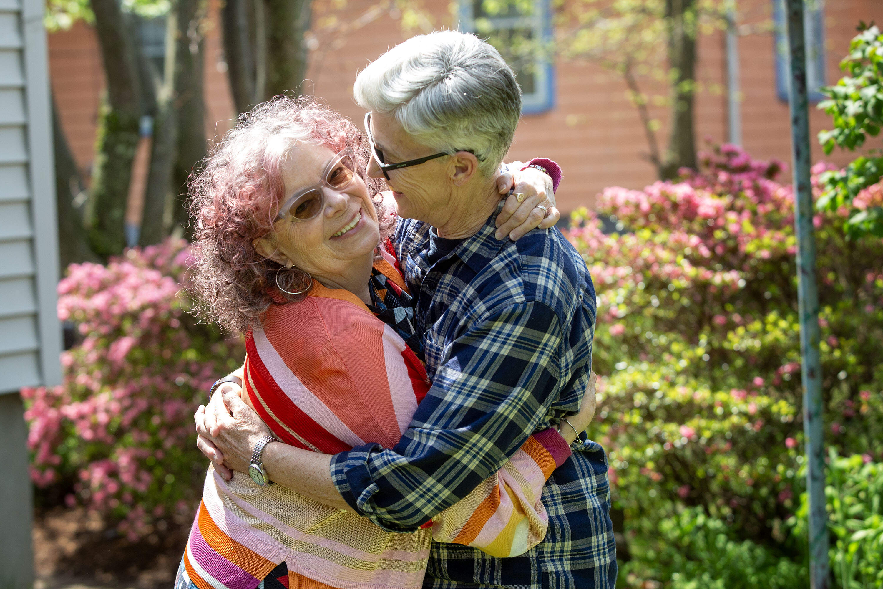 Liz Nania and Sandy Bailey at their home in Roslindale. (Robin Lubbock/WBUR)