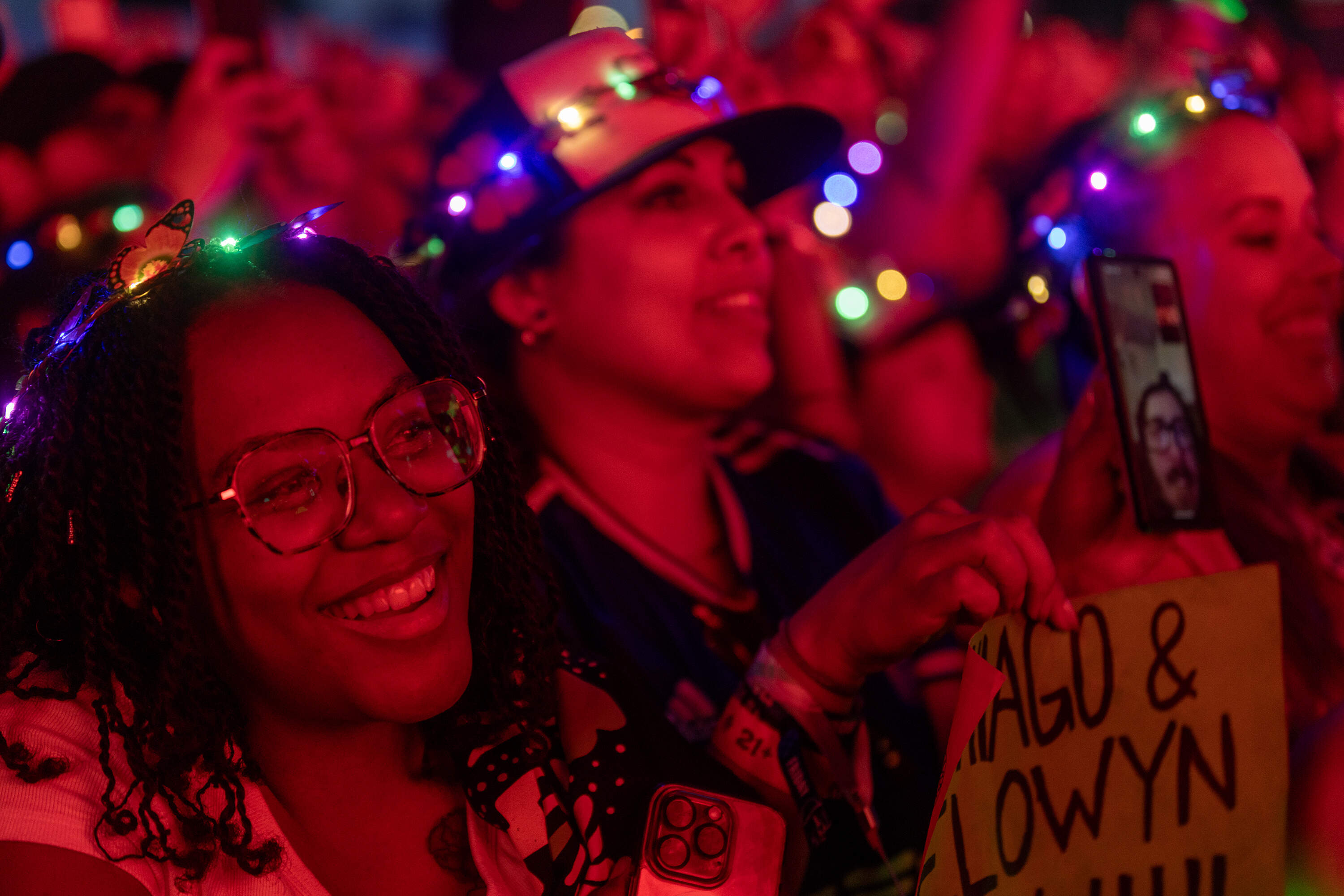 Fans in the crowd get excited as Ed Sheeran prepares to take the stage. (Jesse Costa/WBUR)