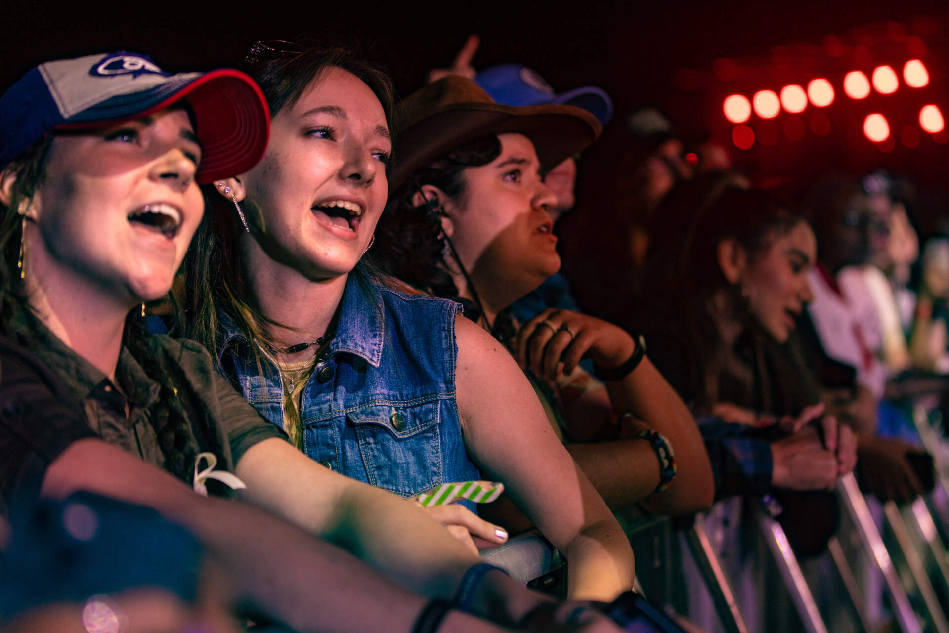 Fans in the front row sing along with Tyler Childers during his headlining set. (Jesse Costa/WBUR)