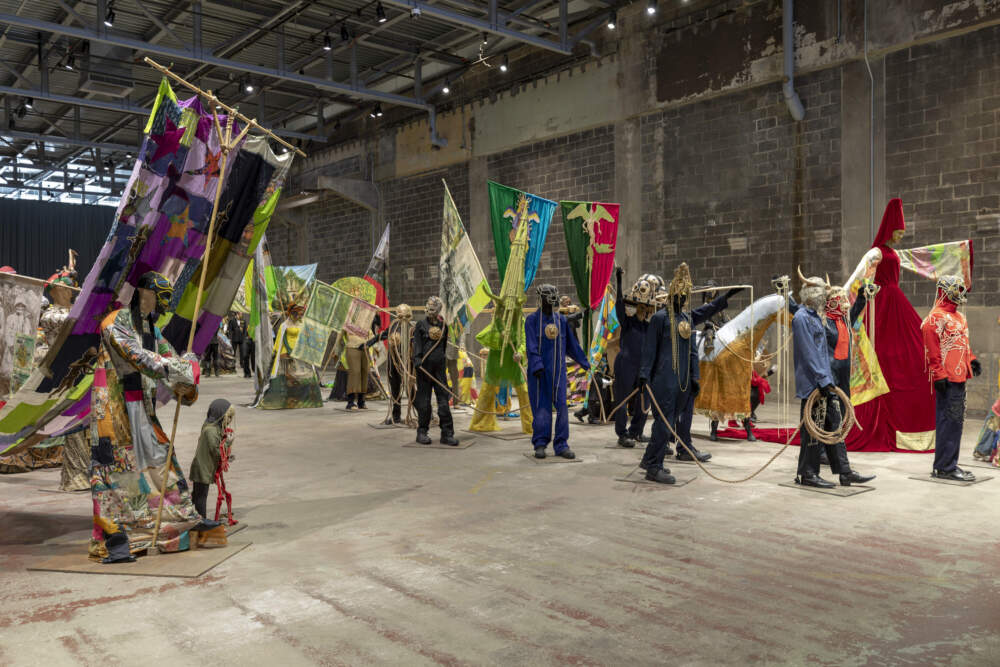Installation view of Hew Locke's &quot;The Procession&quot; (Tate Britain Commission 2022) at the Institute of Contemporary Art/Boston. (Courtesy Mel Taing)